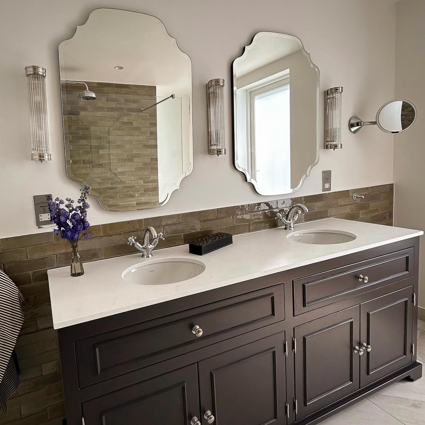 Timeless bathroom design as part of a larger NW5 refurbishment project.
The bespoke vanity unit in F&amp;B&rsquo;s Tanners Brown is extra long and extra narrow for the perfect layout whilst providing generous space to tidy away toiletries and other b