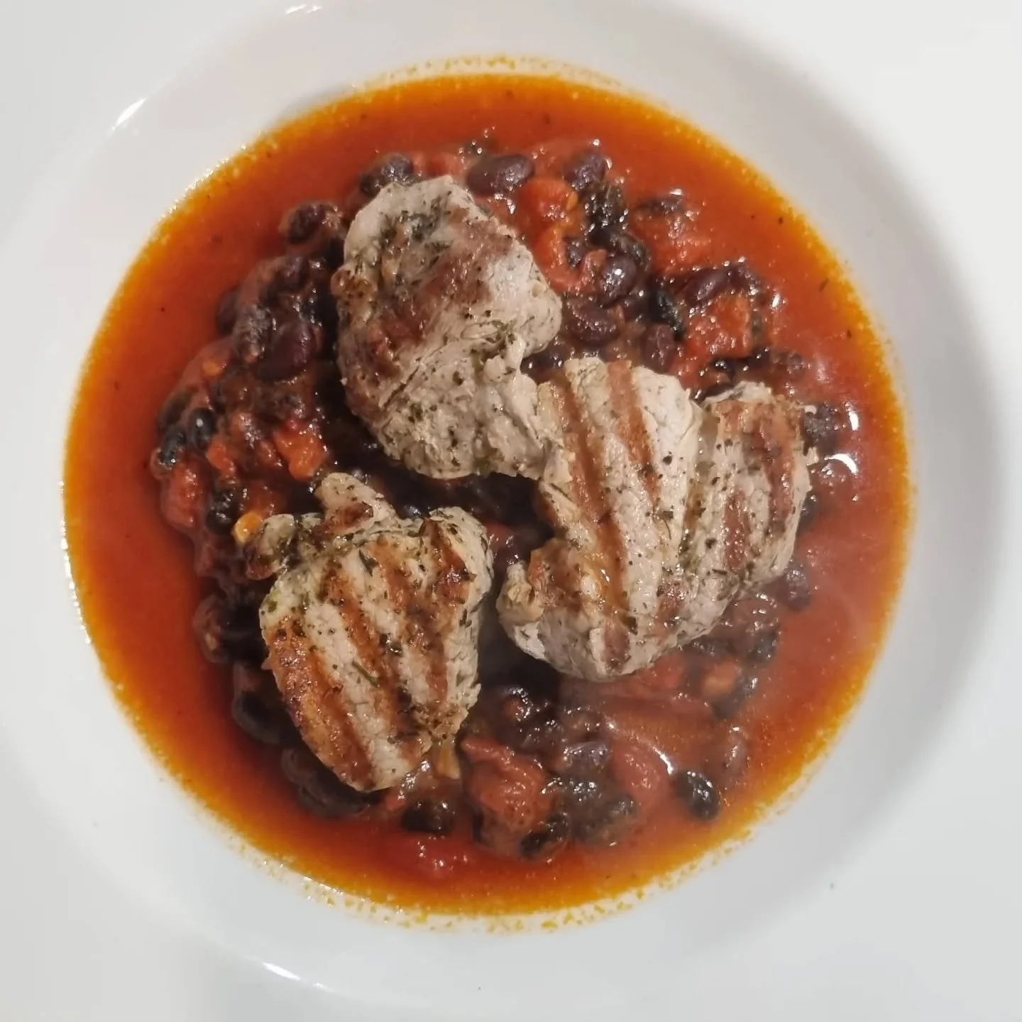 Beautiful free-range pork fillet, here with black bean and tomato. Simple and delicious! #randallsbutchers #wandsworthbridgeroad #porkfillet #freerange #freerangemeat