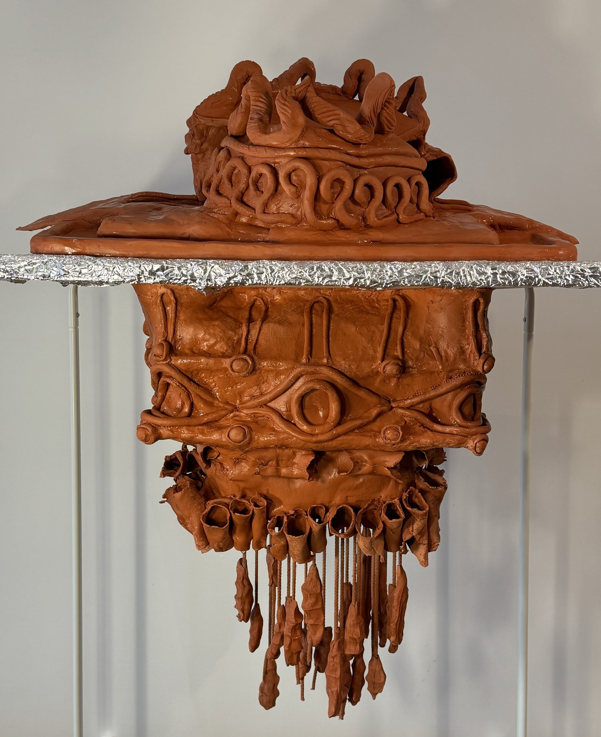 The Symbiotic Islands - Clay Sculpture - 2023 - 31 (L) x 22 (w) x 33 (h) inches - 

This symbiotic island is designed as a place of escape for humans in the case of an environmental catastrophe where land is no longer inhabitable. I designed the isla