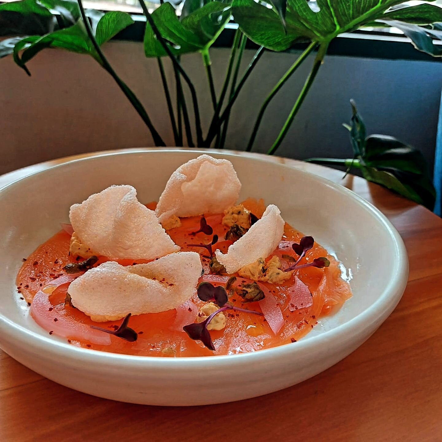 And now, from the bottom of the sea.

Salmon Carpaccio with the beautiful @akaroasalmonnz, kimchi cream cheese, popped capers, pickled onions, lemon oil &amp; prawn crackers

Calamari with lemon mayo and furikake sesame salt

More new dishes are comi