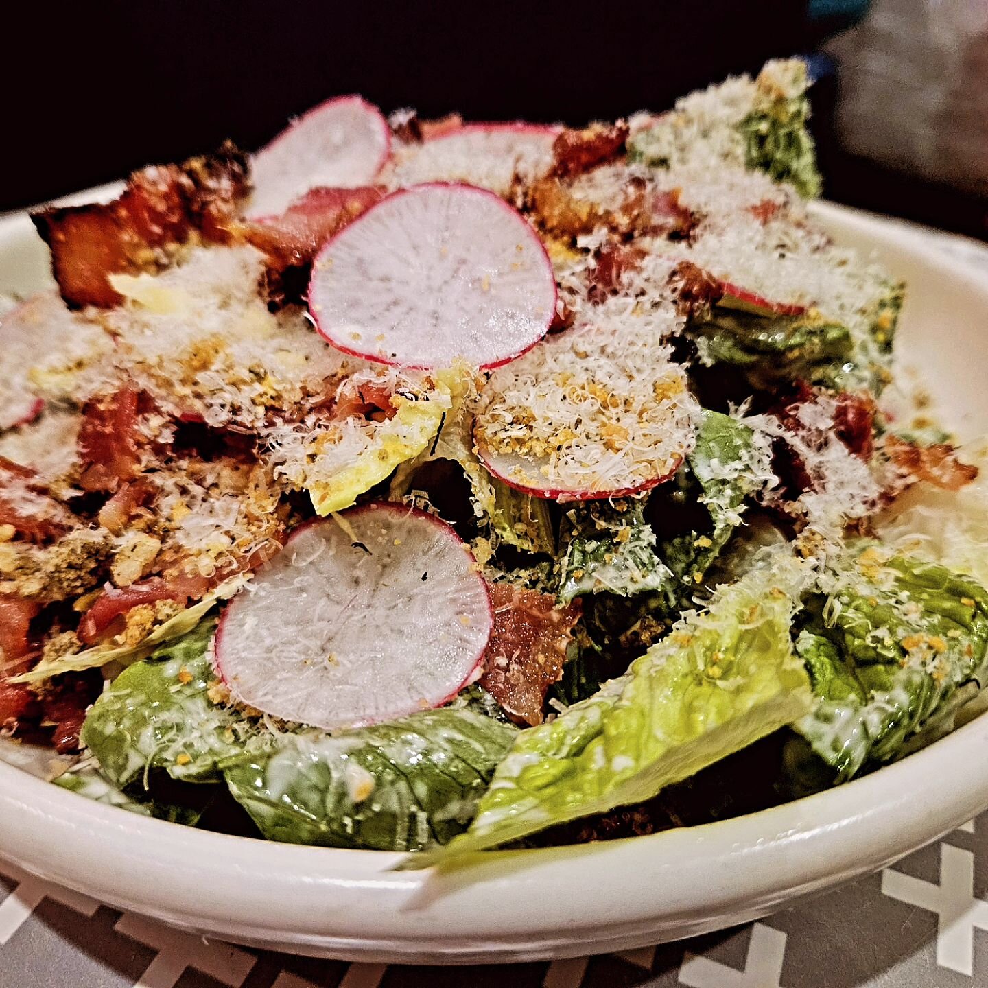 This is our Canadian style Caesar Salad! 🍁

No egg, no anchovies. Just straight up creamy cheesy goodness 🧀🥬🥓 with a touch of bacon!

Cos lettuce is tossed in our homemade thick &amp; creamy Caesar dressing with maple bacon bits, caper crumb, loa