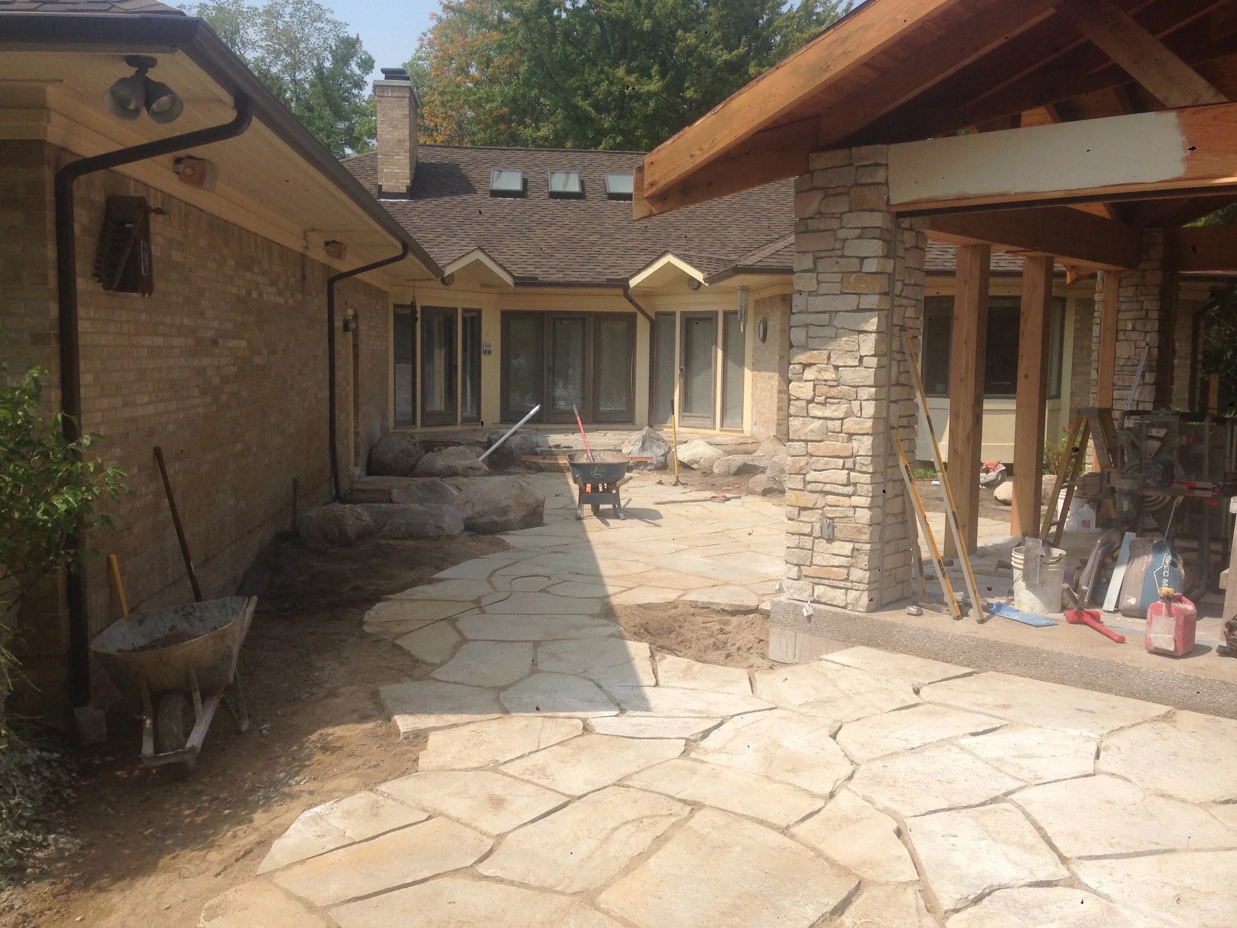 Stone courtyard with covered area
