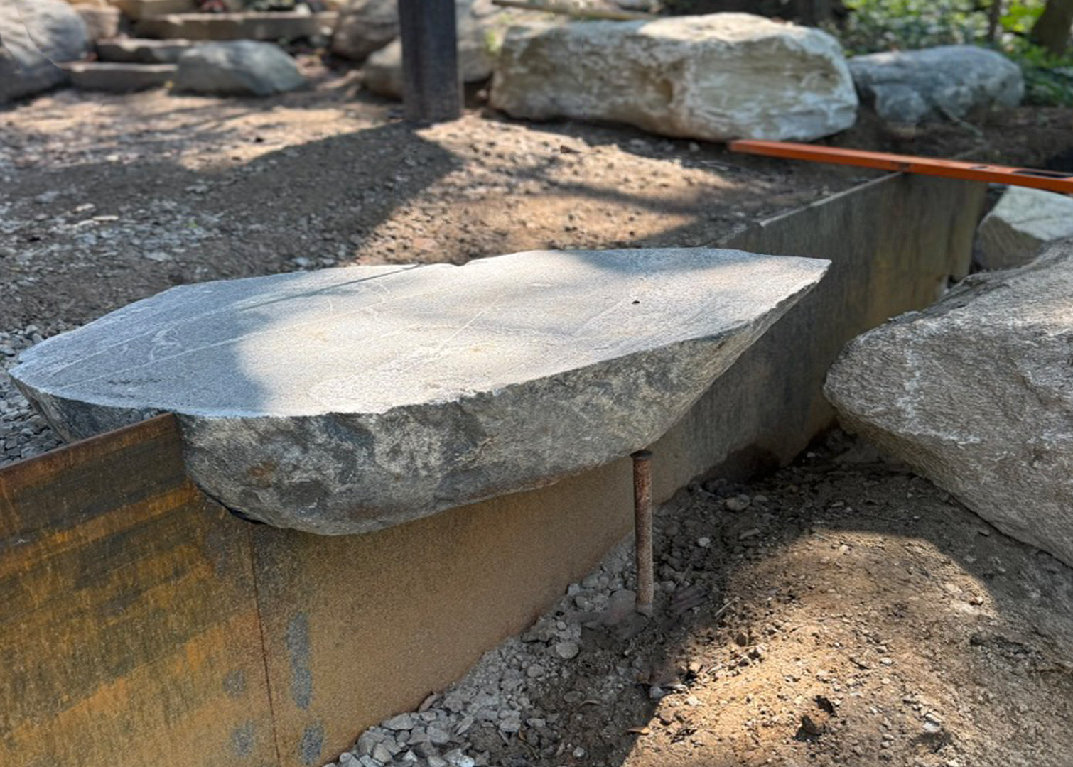 Steps being constructed from boulders