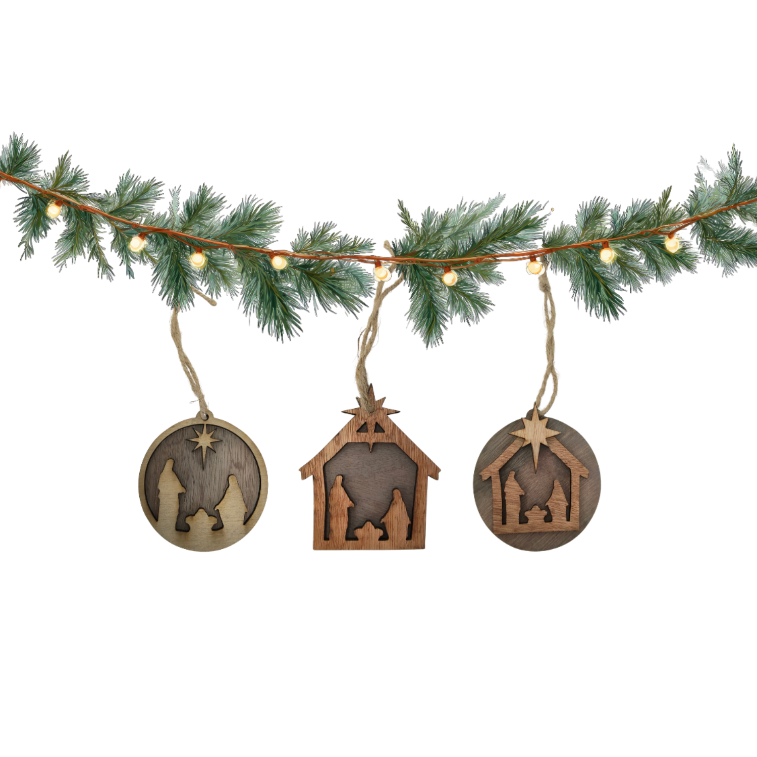 Set of 3 Nativity Ornaments - Hanging from Christmas Garland.png