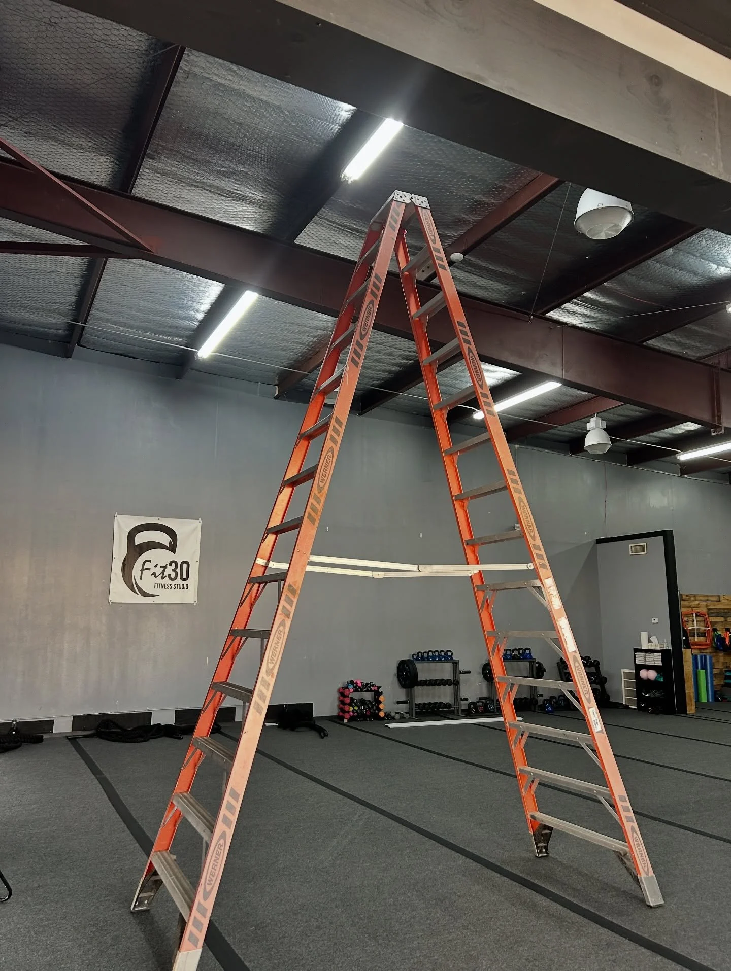Apparently you need the tallest ladder from Lowe&rsquo;s to keep our lights shining bright. 😅💡
We&rsquo;ve got a little glow-up happening around here &mdash; fresh paint coming soon and (because Stacey can&rsquo;t sit still) a brand-new mural desig
