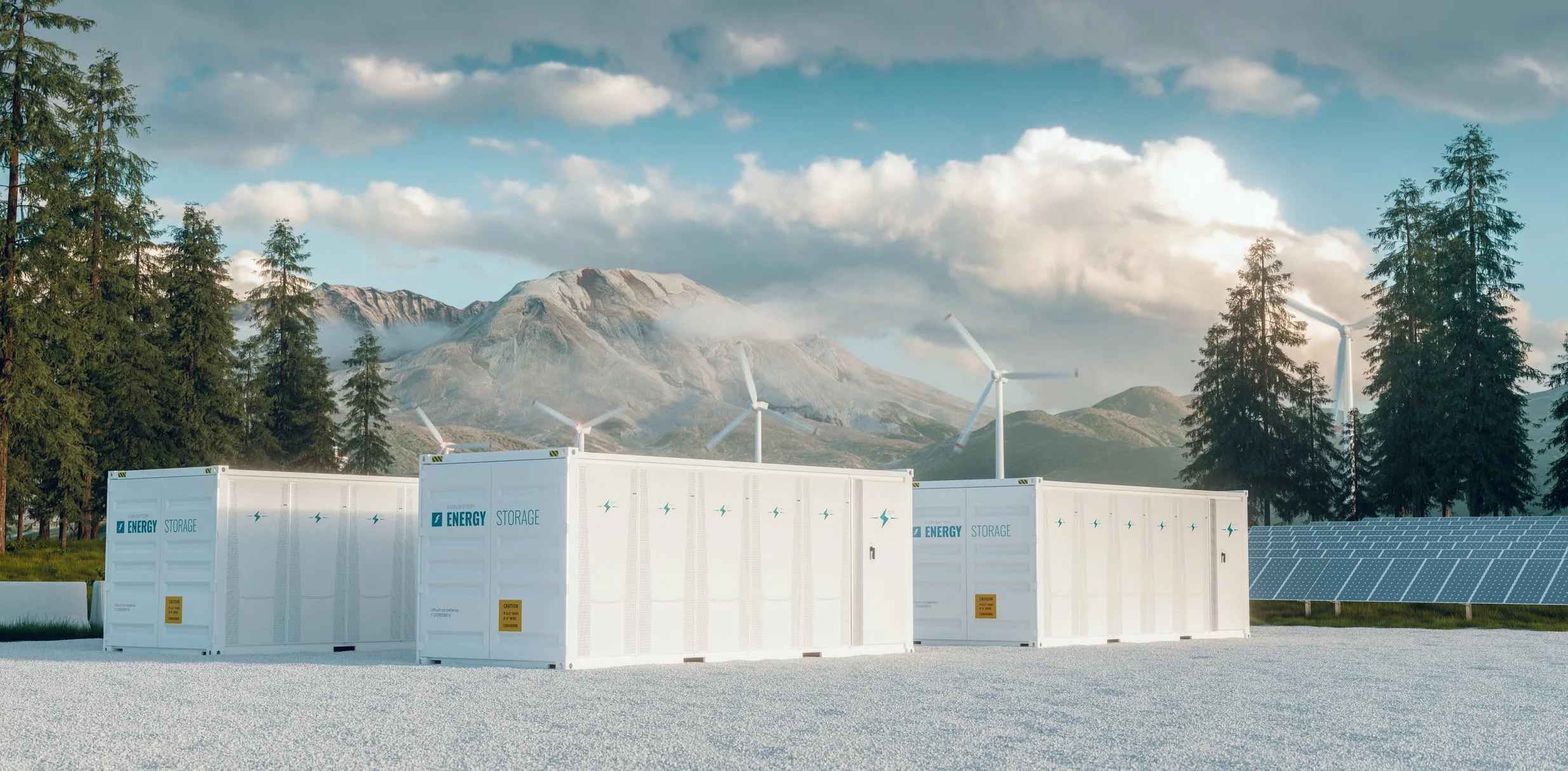 Image of a battery storage BESS system in front of wind mills and a mountain range