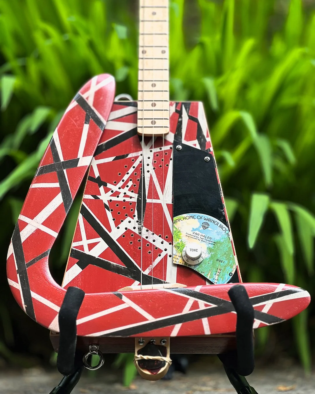 Eddie VanHalen Frankinstrat three string guitar with Frankinstrat painted boomerang.