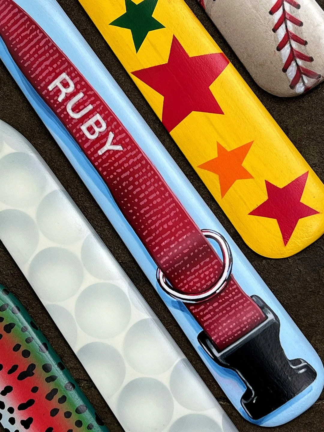 Close up of commissioned groomsmen gift boomerangs.