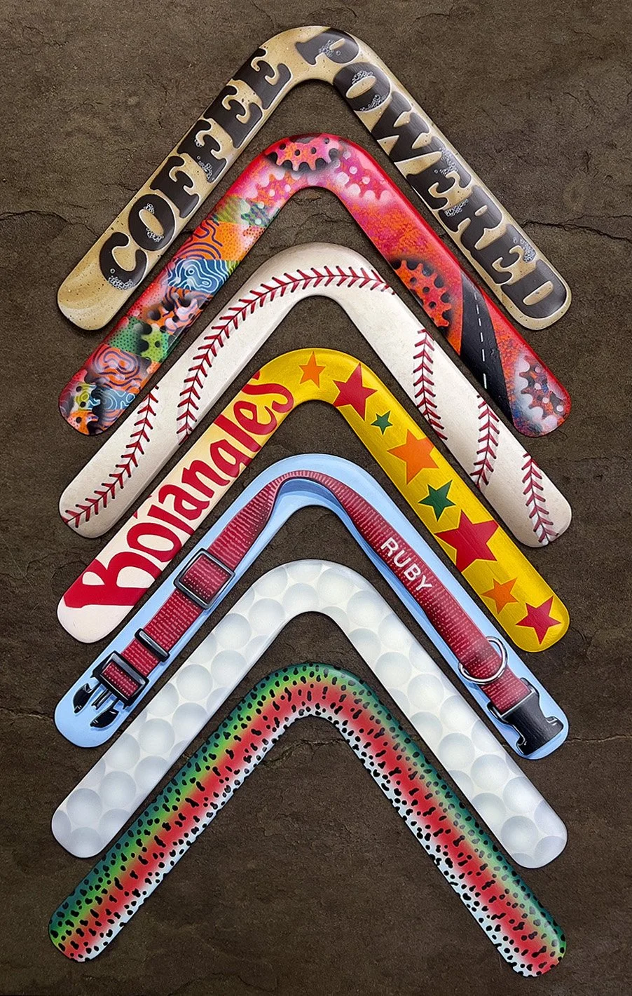 Collection of commissioned groomsmen gift boomerangs.