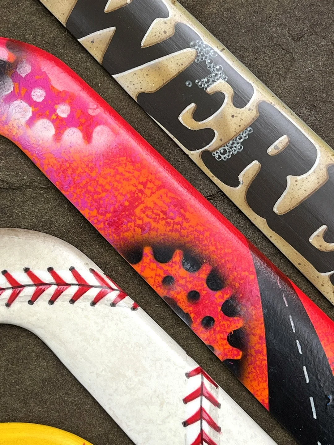 Close up of commissioned groomsmen gift boomerangs.