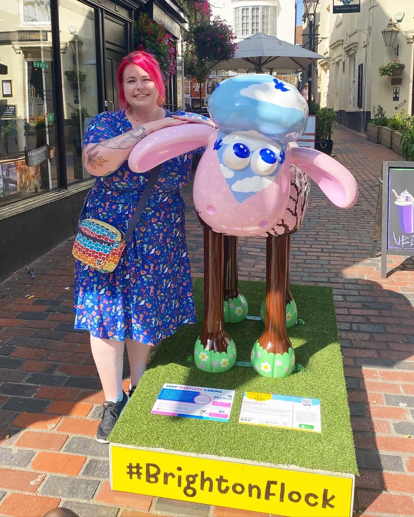 Me with my Shaun the Sheep sculpture 'Bleats & Blossom' (Wild in Art "Shaun by the Sea' Trail, 2023)