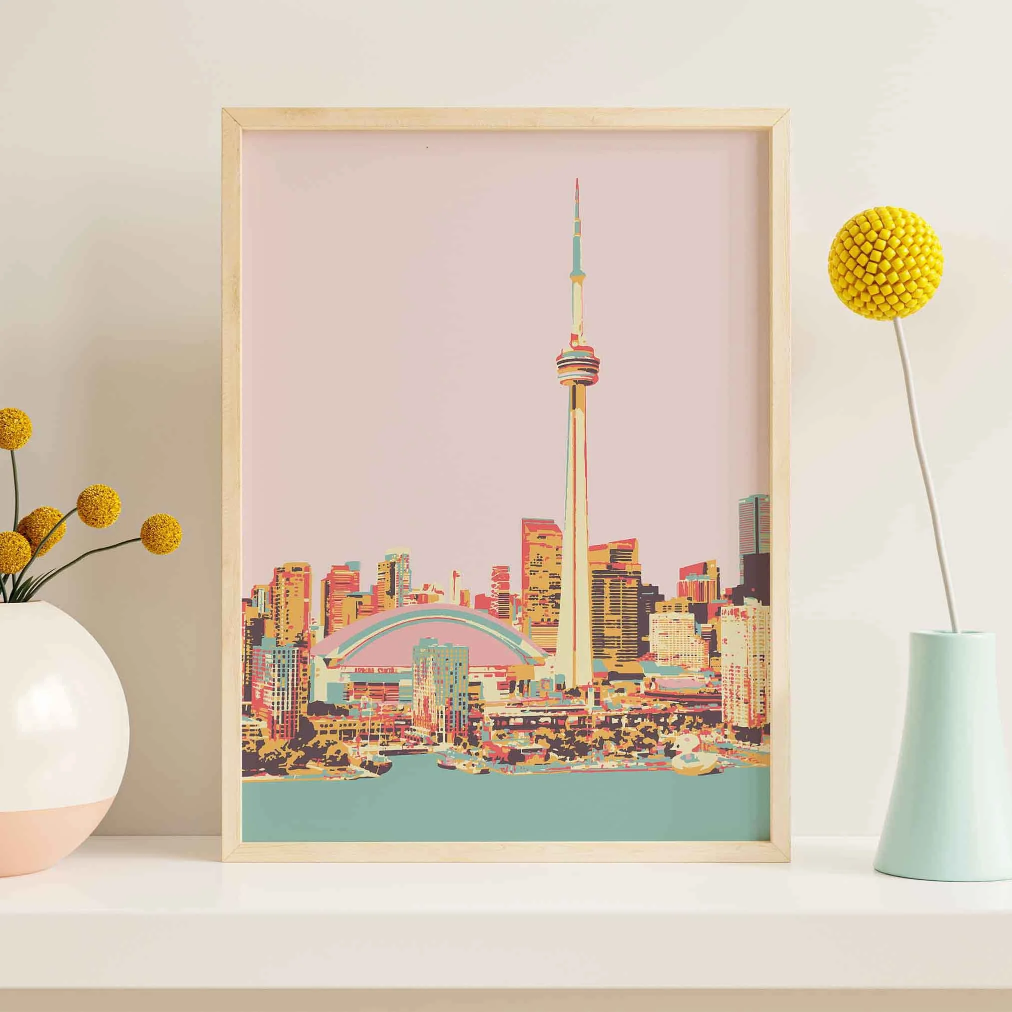 A framed Toronto poster.