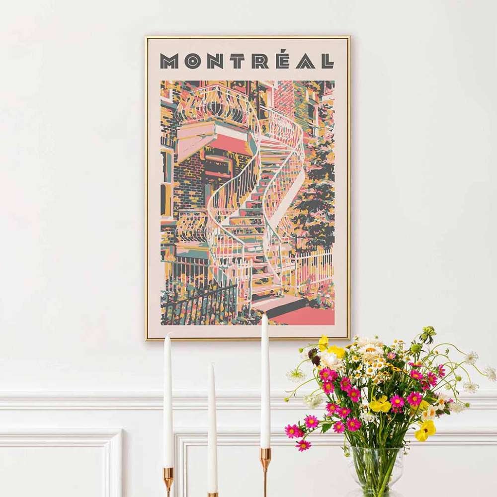 Montreal poster in pink, next to a vase of flowers.