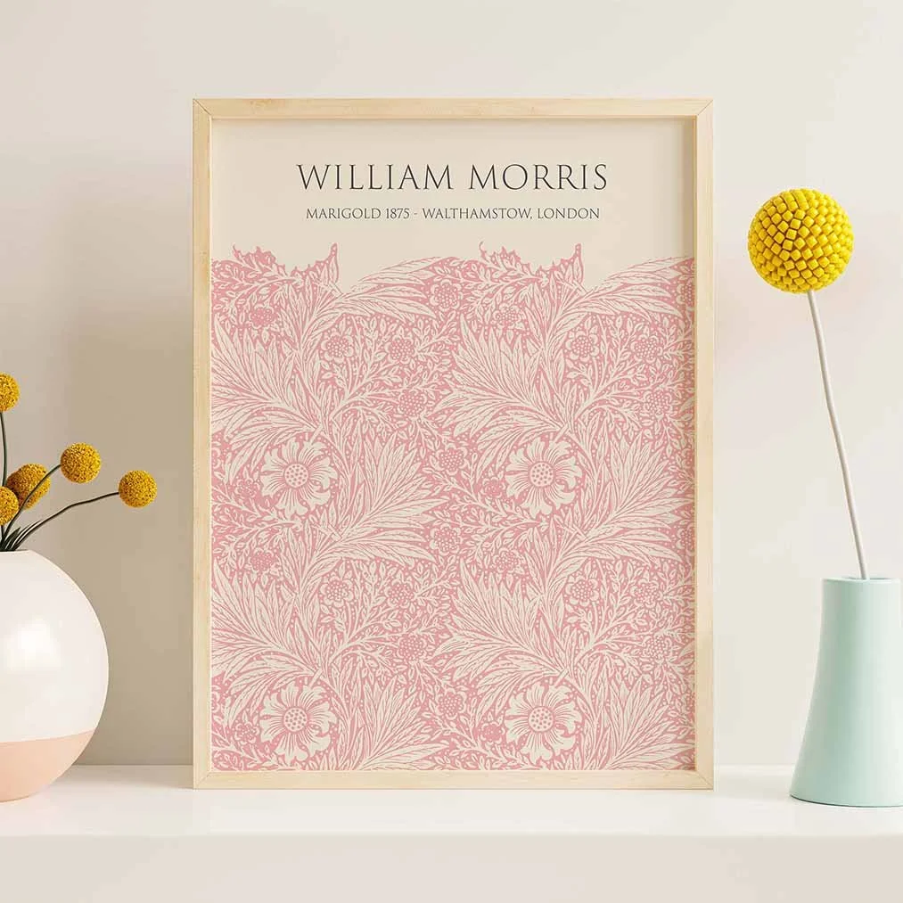 A framed poster featuring a design by William Morris.