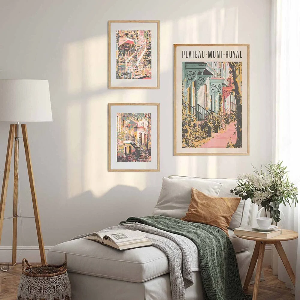 Three Montreal art prints next to a chaise longue.