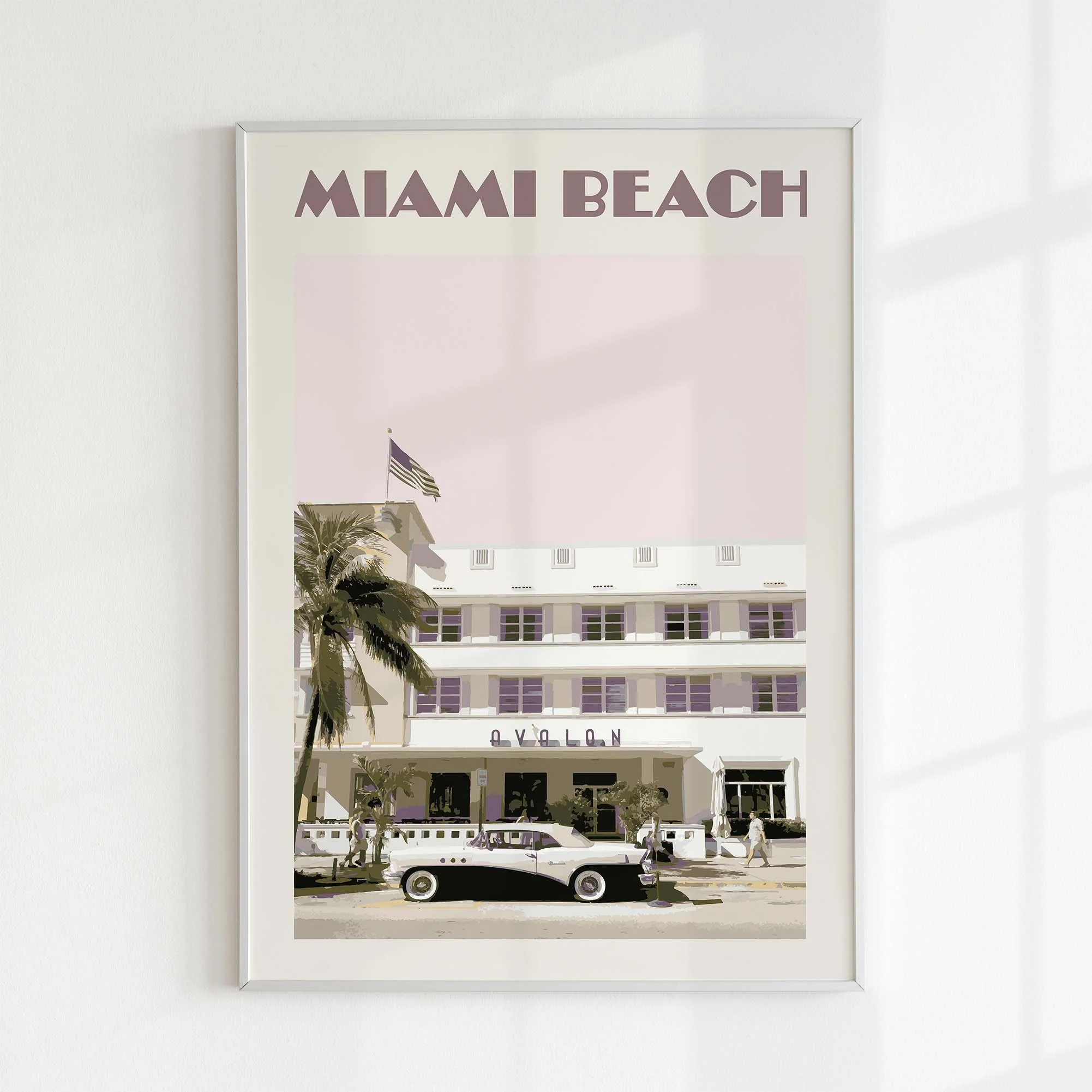A Miami Beach poster on a white wall.