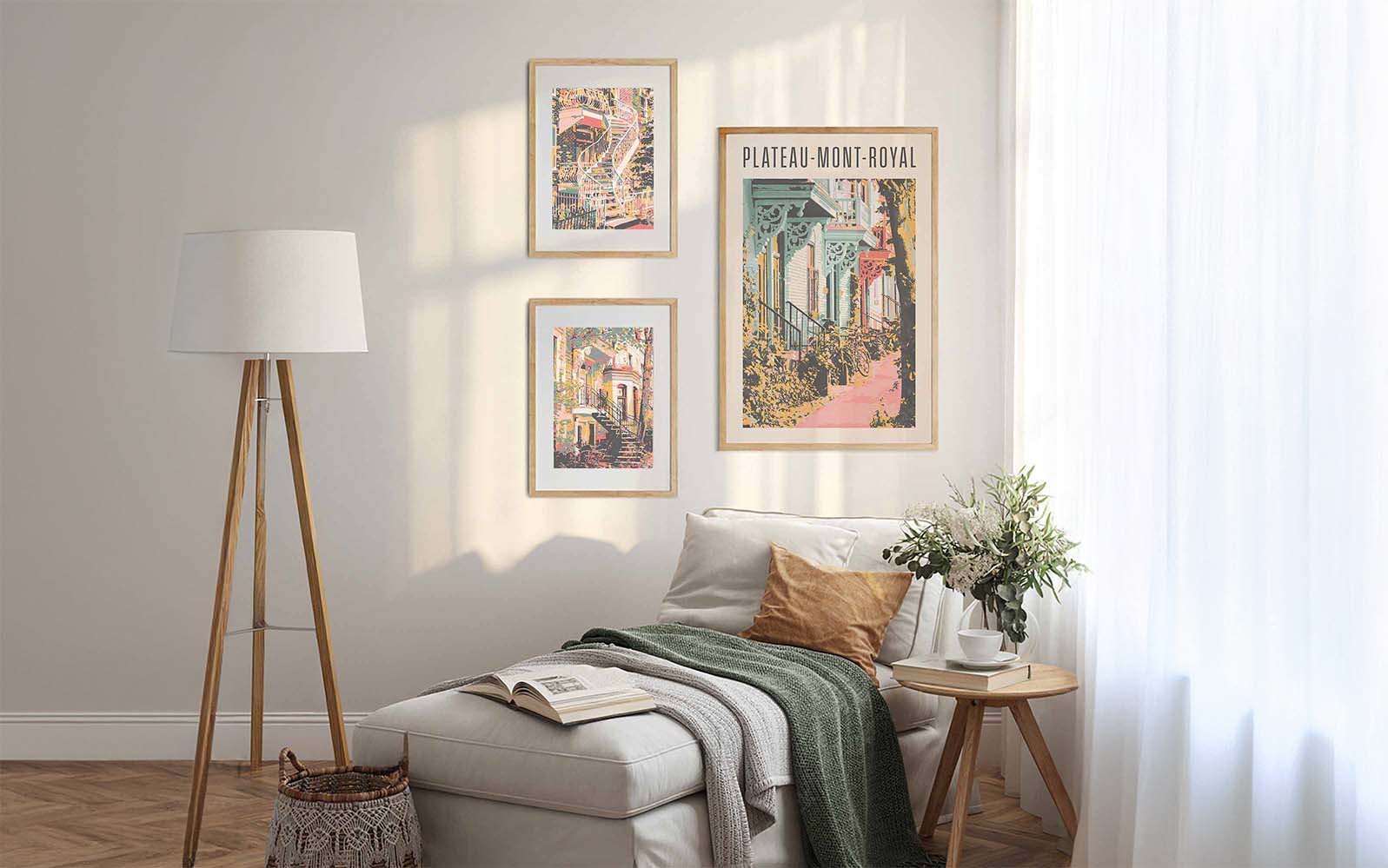 Cozy bedroom corner with a white chaise lounge, pillows, blanket, side table with flowers, and wall art.