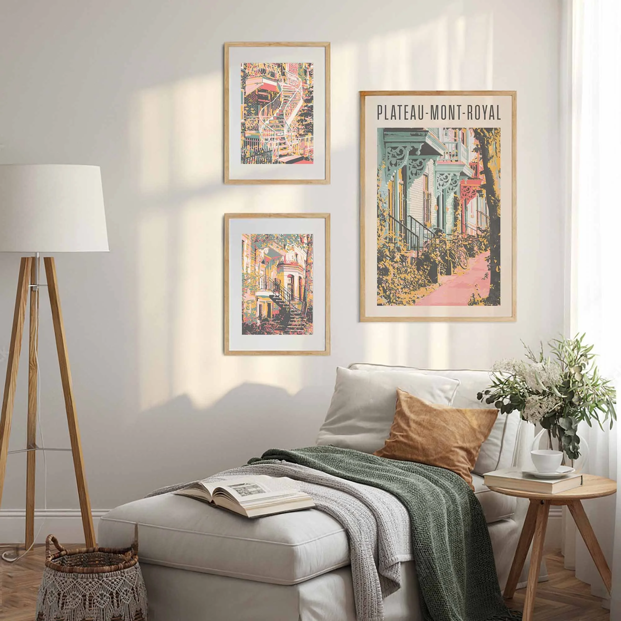 Reading nook next to a wall with three Montreal art prints.