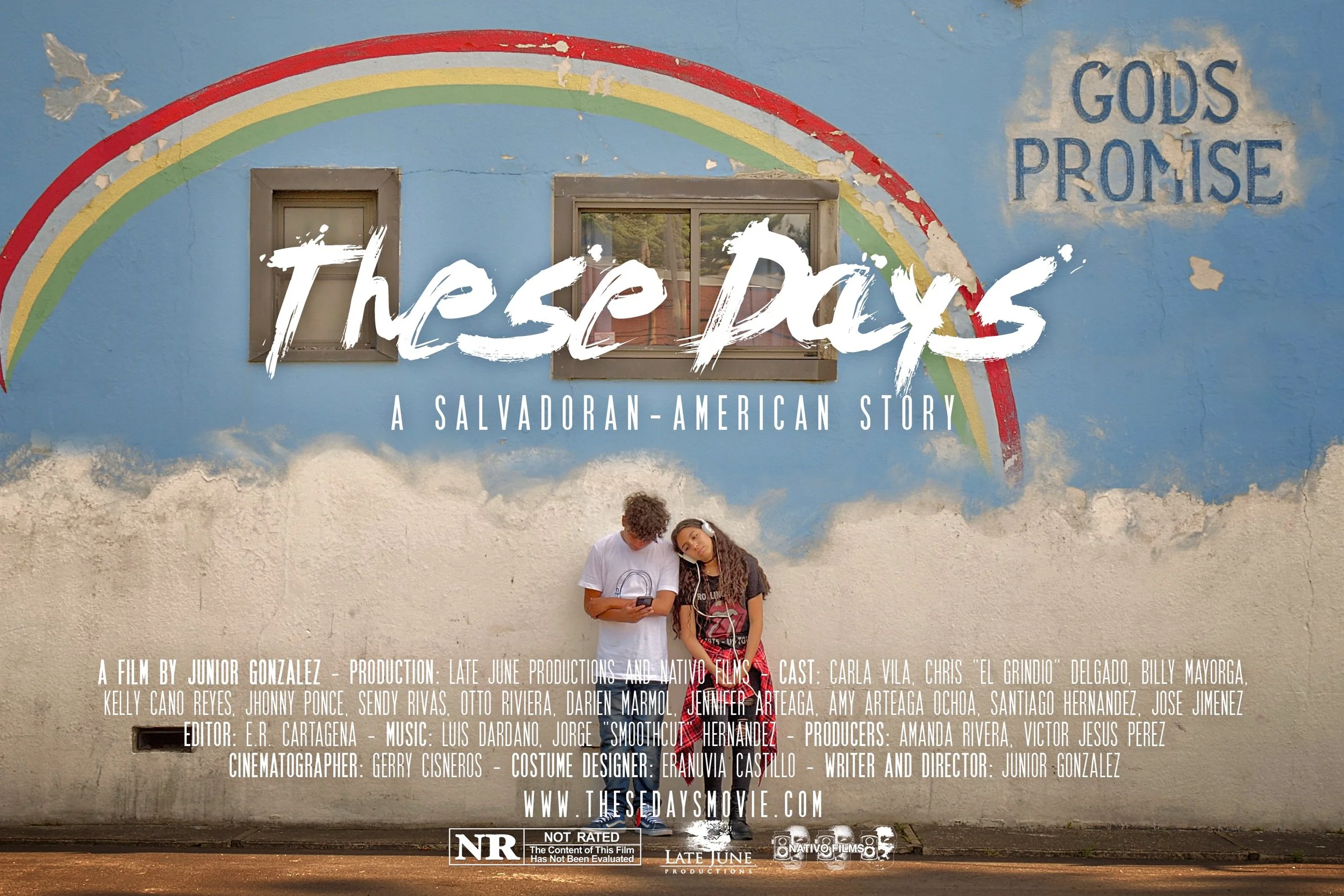 Movie poster for "These Days: A Salvadoran-American Story" showing two teenagers, a boy and a girl, standing against a colorful mural of a rainbow and clouds on a blue wall with the words "GODS PROMISE" painted on it. The title "These Days" is writte