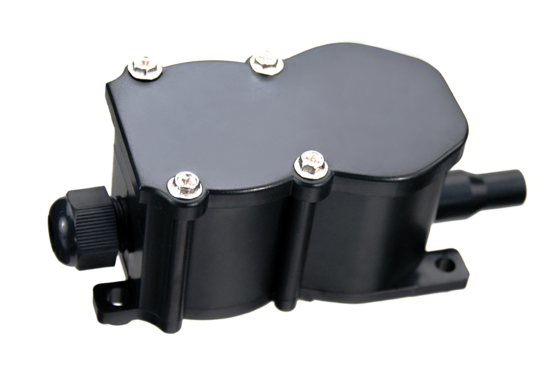 A black plastic pneumatic air switch for sensing edges.