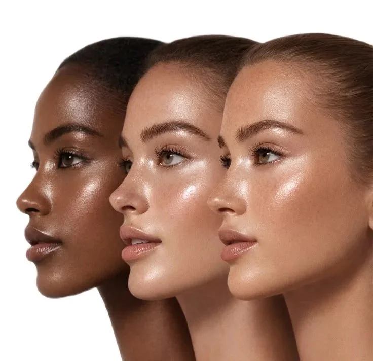 Three women with different skin tones and hair colors, displaying glowing skin, looking to the right.