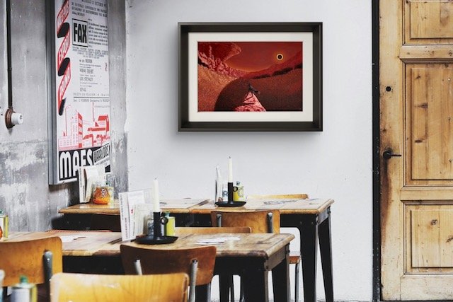 Birth of a Tyrant – Dark Fantasy Art Print displayed in a stylish cafe, adding a bold, dramatic touch to the space