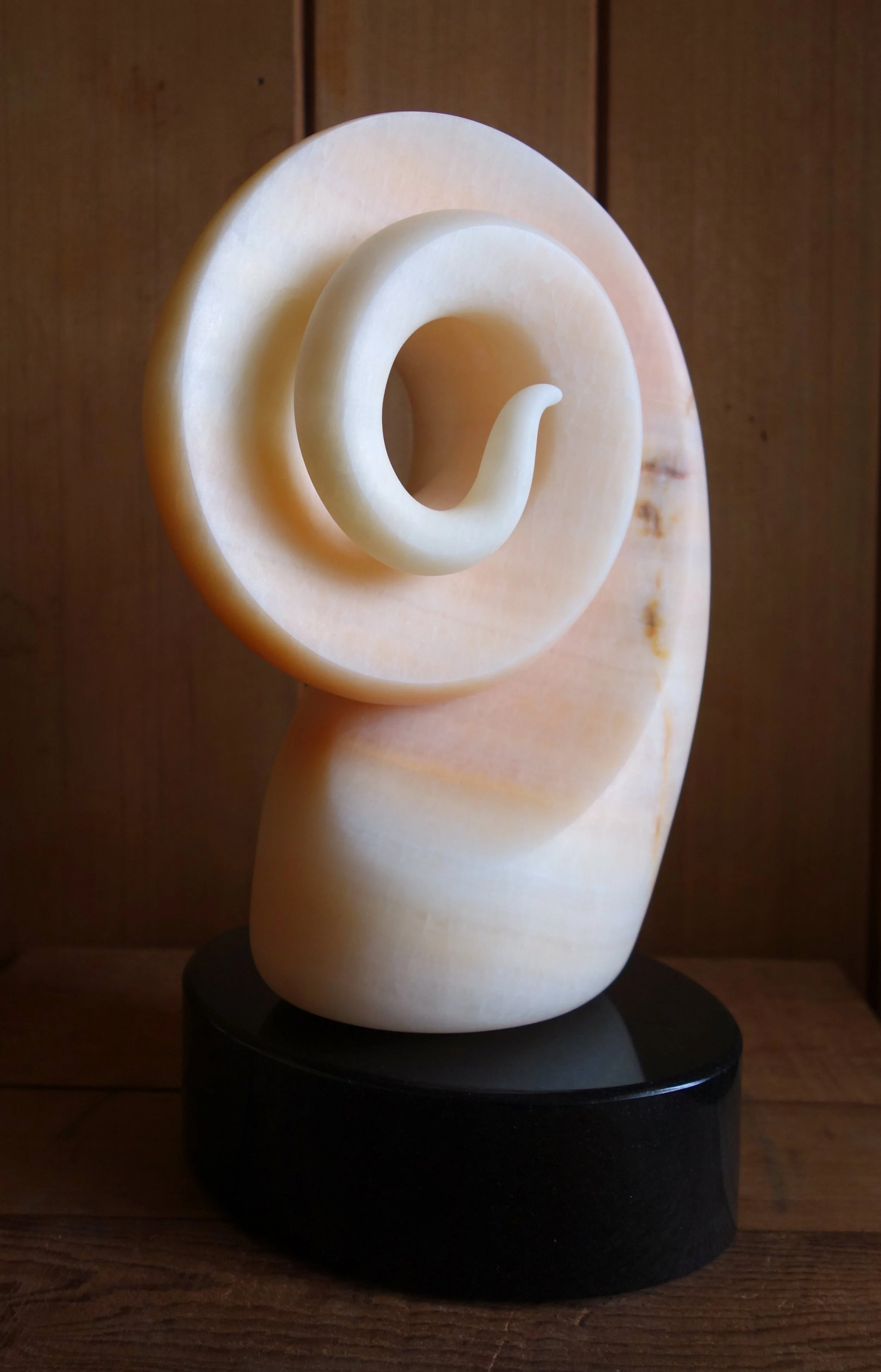 Dangerous Game - Peach onyx on granite base - 2025