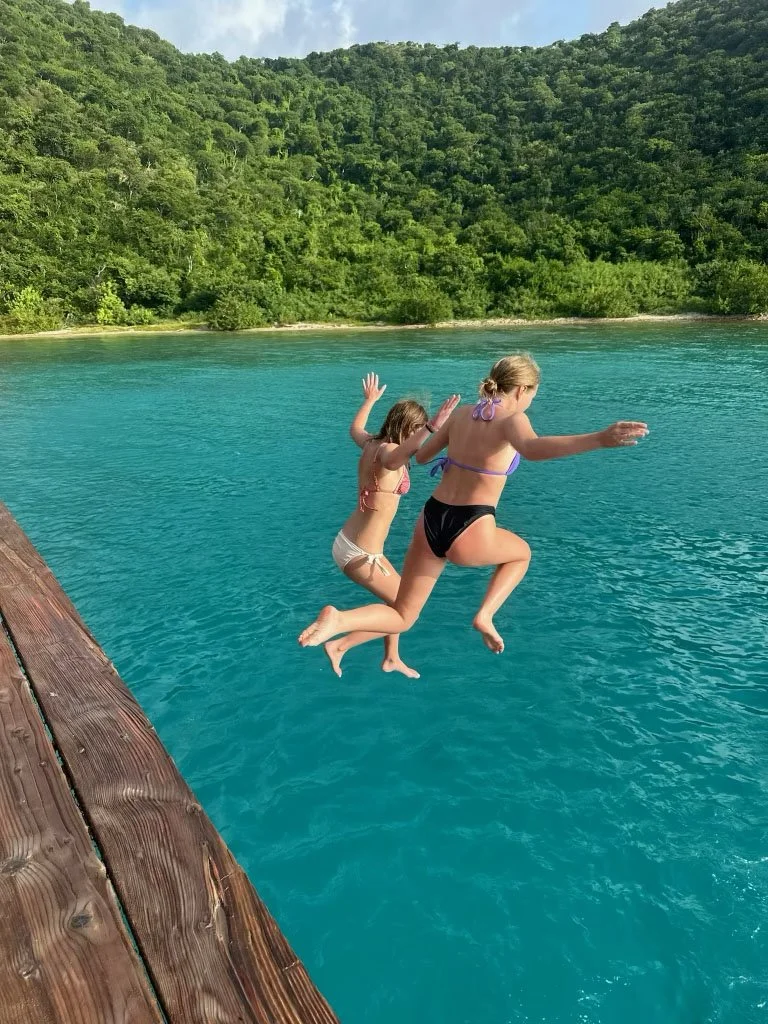 two child guests jumping into the water.jpg