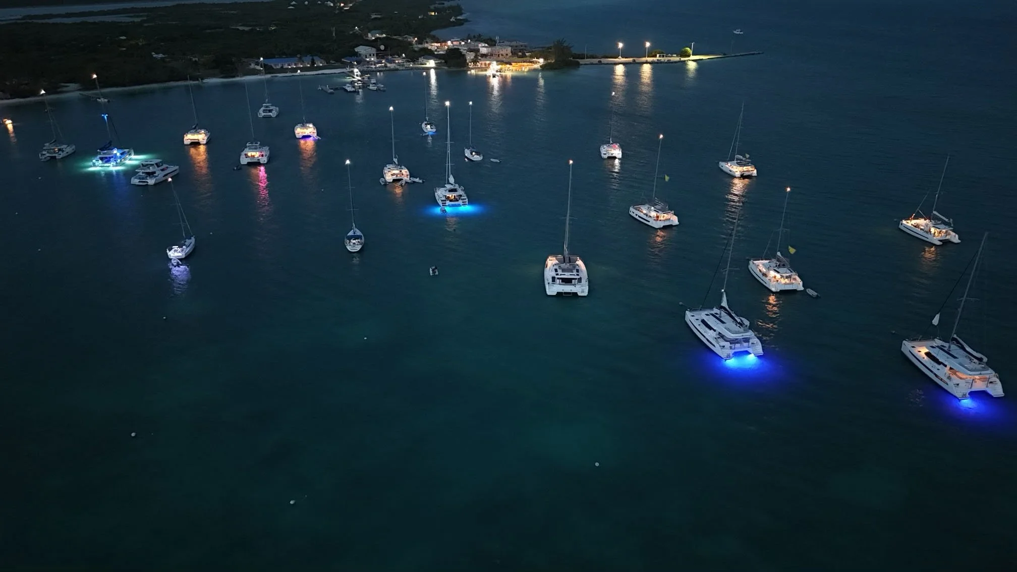 overhead view in bay with several vessels at night.jpg
