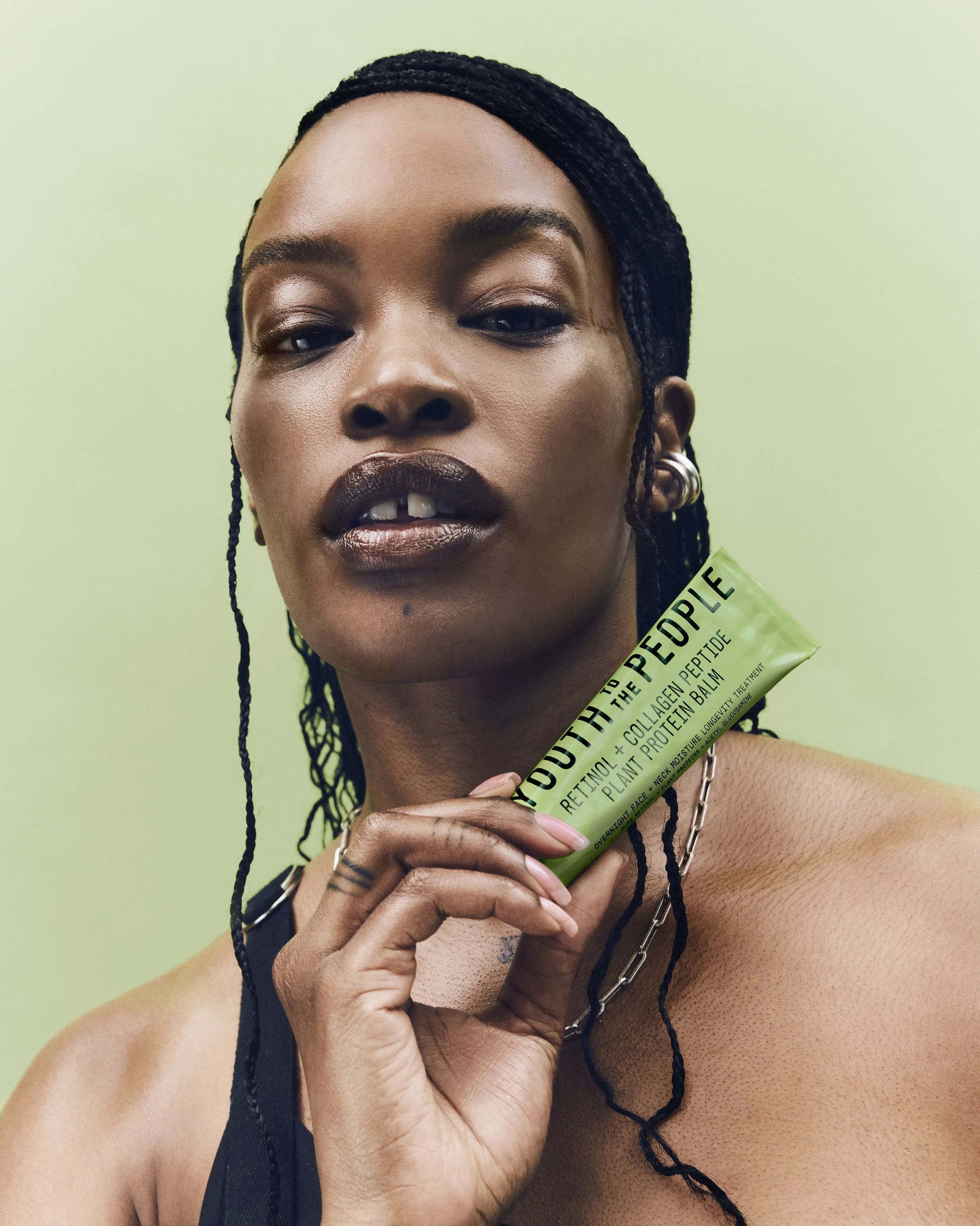 YTTP_ProteinBalm_26_Photo_Model_Hero_Mecca_ModelWithProduct_2022.jpg