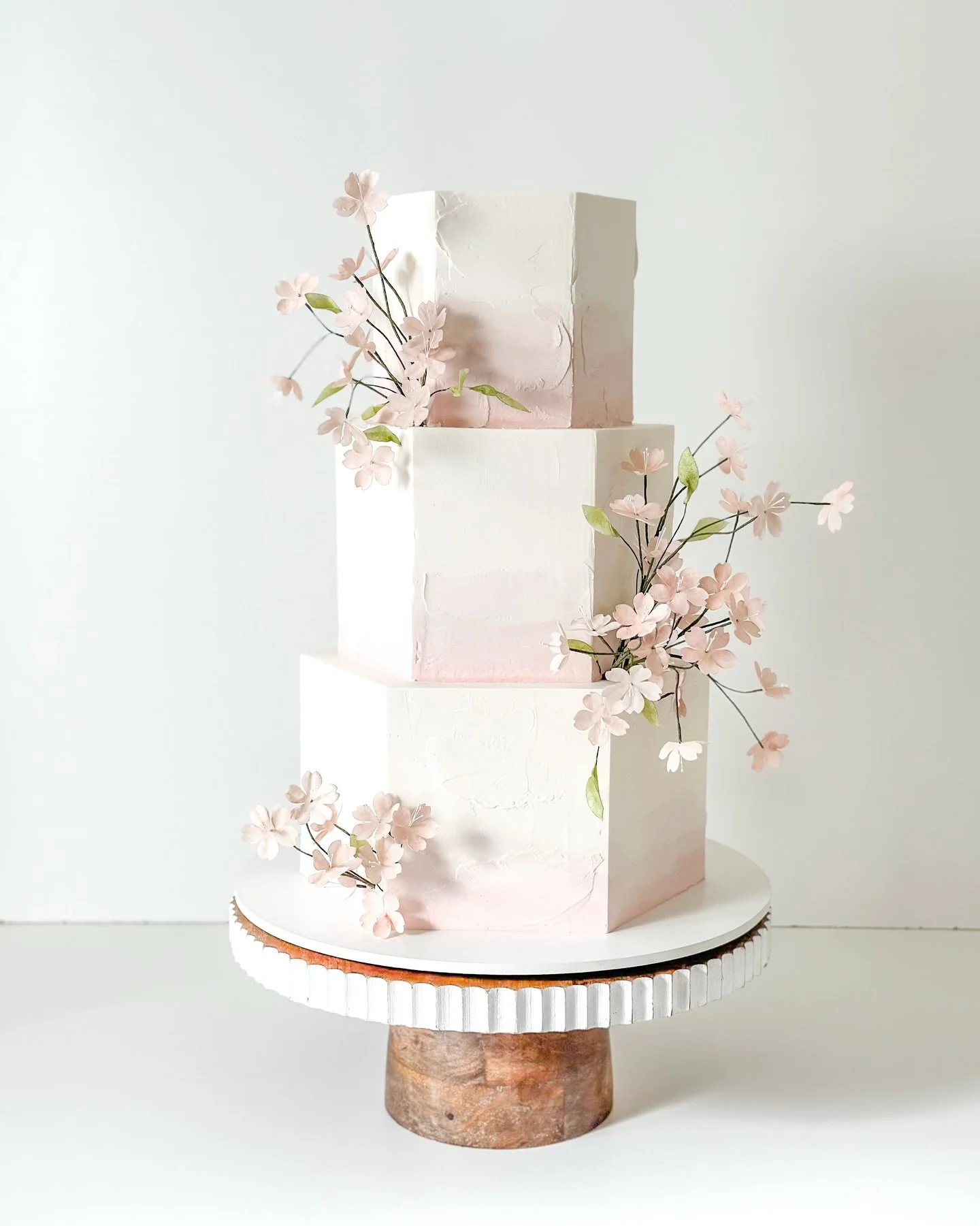 Cherry blossoms for Megan + Marcus 🌸

Craft Flavors: Amaretto Blackberry + Malted French Silk

#sandiegowedding #ranchosantafe #weddingcake #luxuryweddingcake #waferpaper #connorscraftcakes