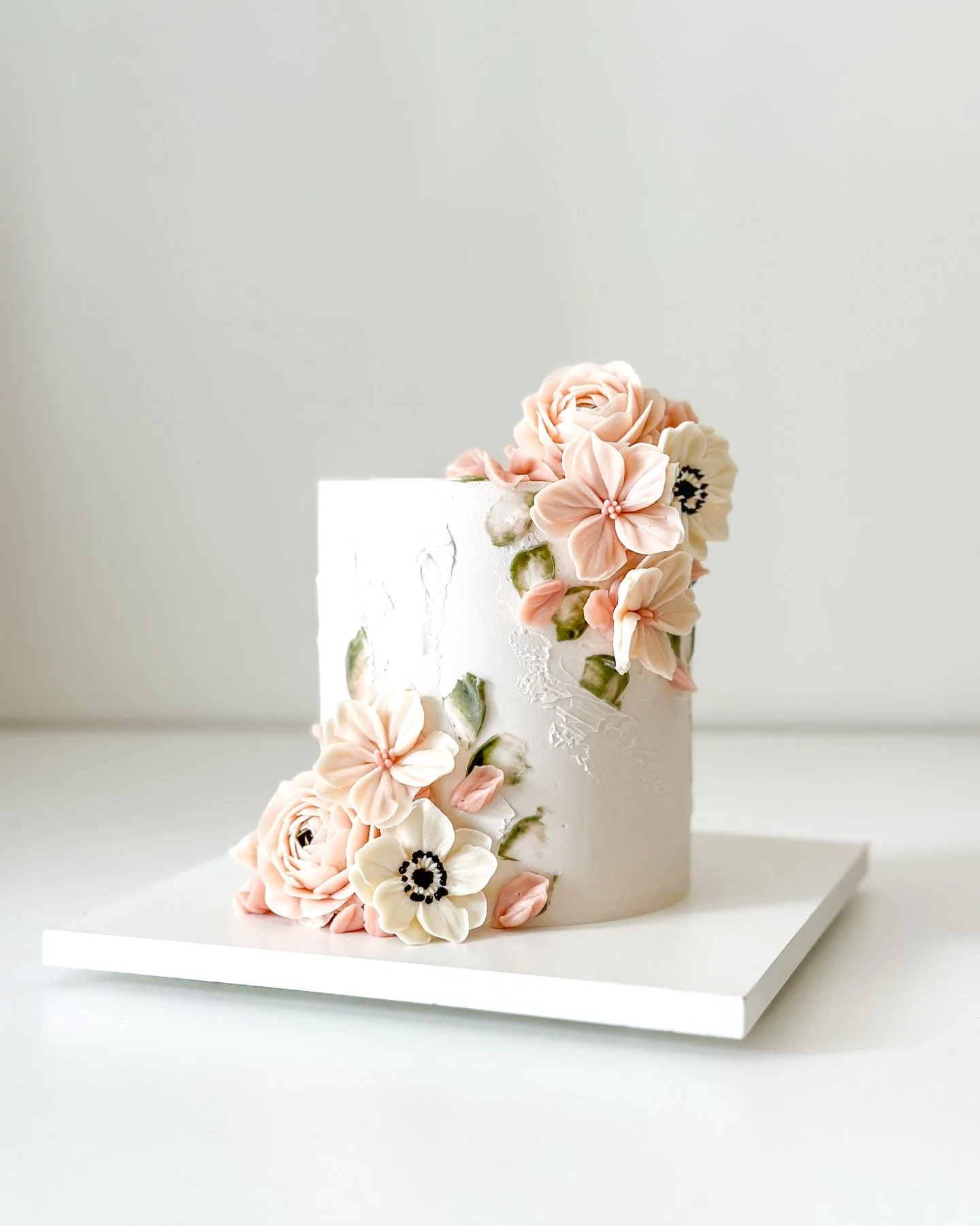 For Mike + Karla&rsquo;s 1st Wedding Anniversary 🌸🌿

Craft Flavor: Amaretto Blackberry 

#sandiegocakes #buttercreamflowers #buttercreamflorals #weddingcake #connorscraftcakes