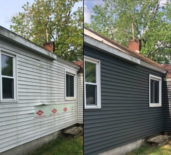 Before and after photos of house siding renovation: left side shows old, dirty white siding; right side shows new, dark gray siding.