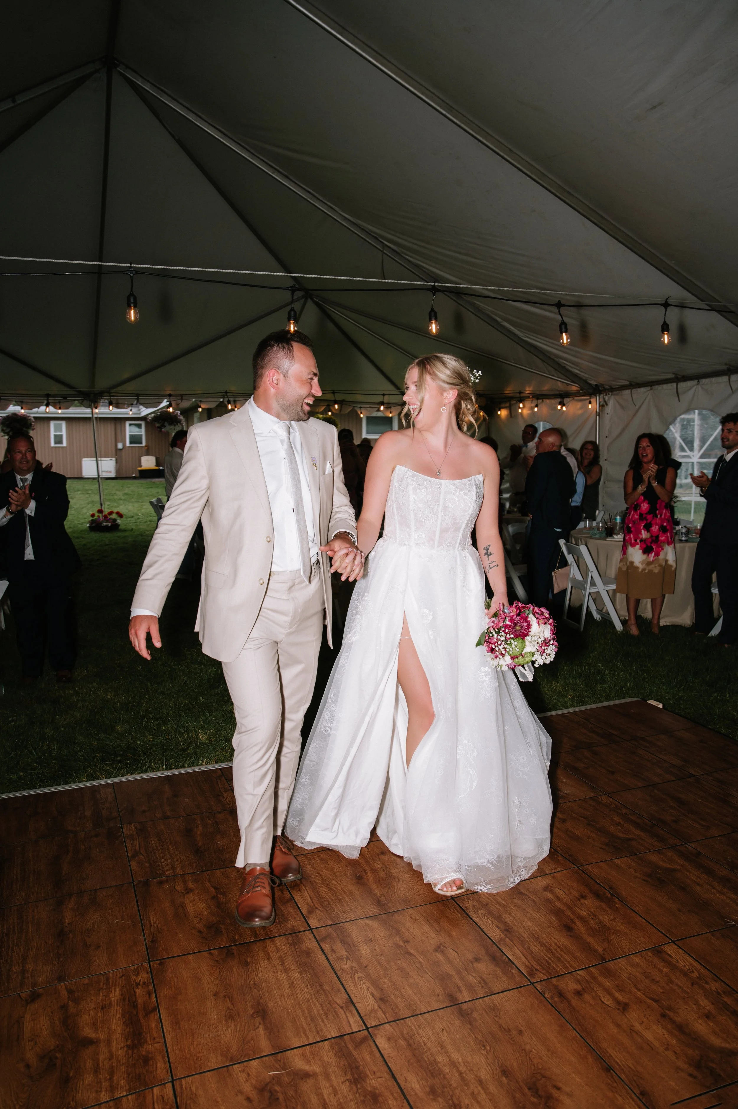 bride and groom walking into reception.jpg