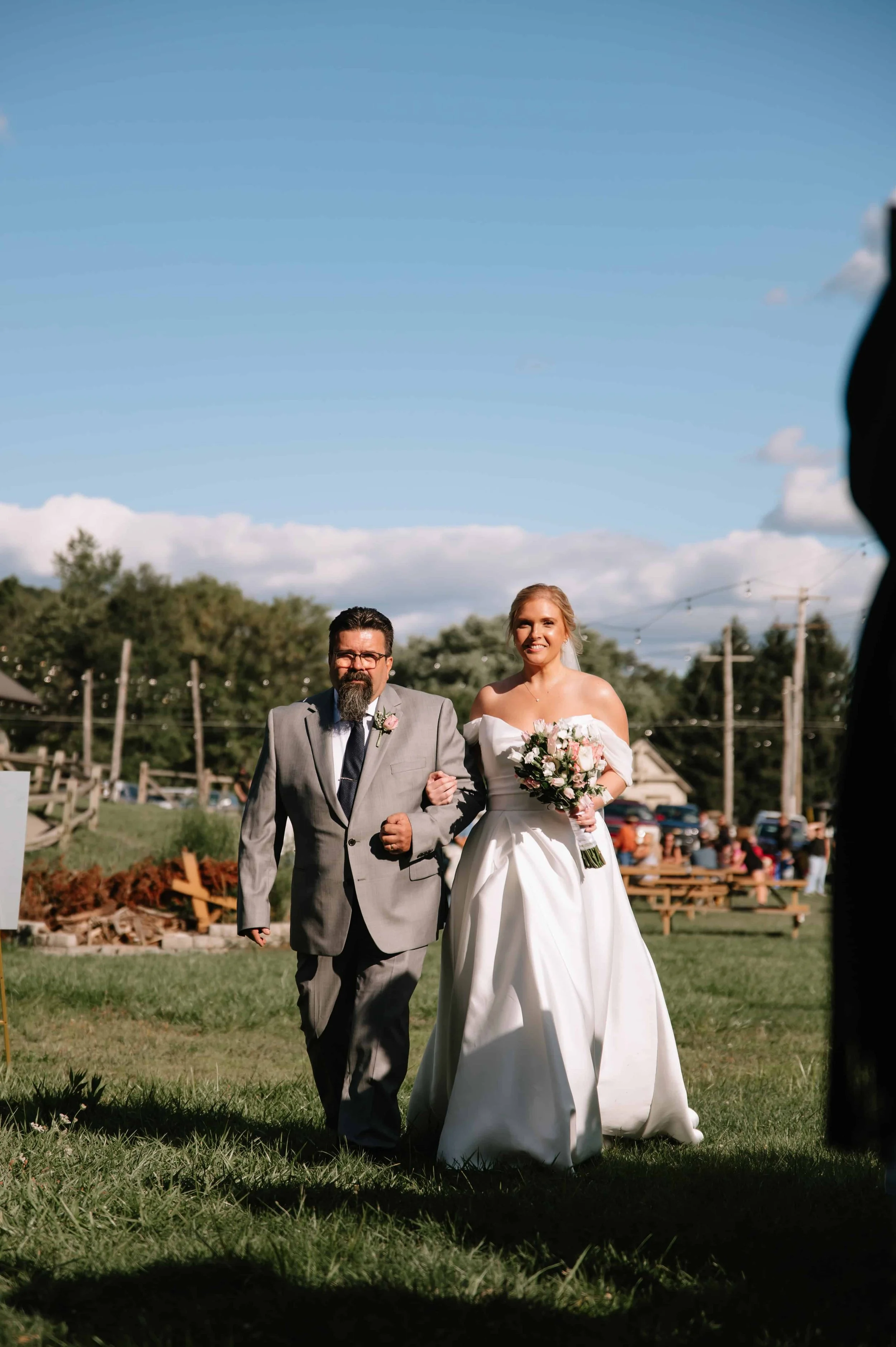 Bride walking down aisle at Farm by Beer Tree Brew