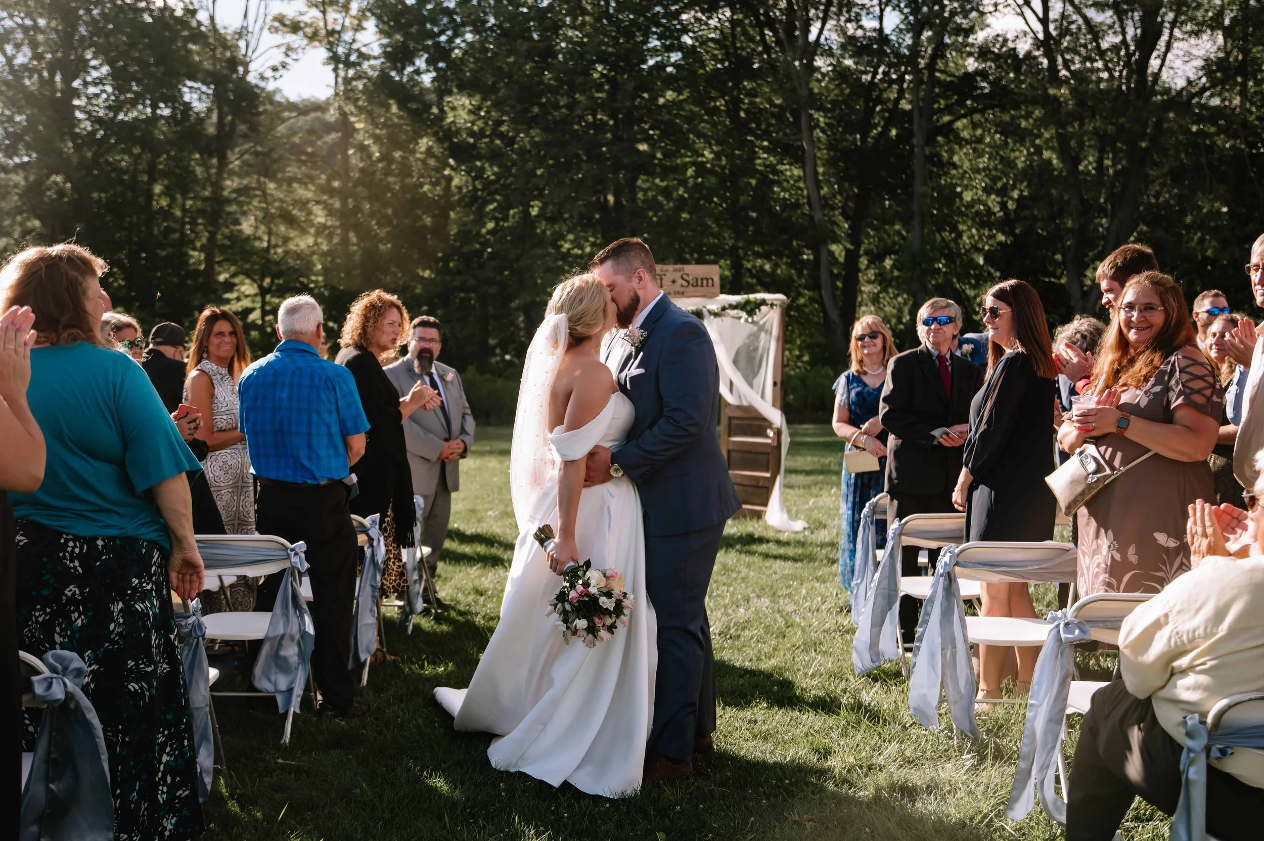 couple walking back down the aisle after wedding ceremony
