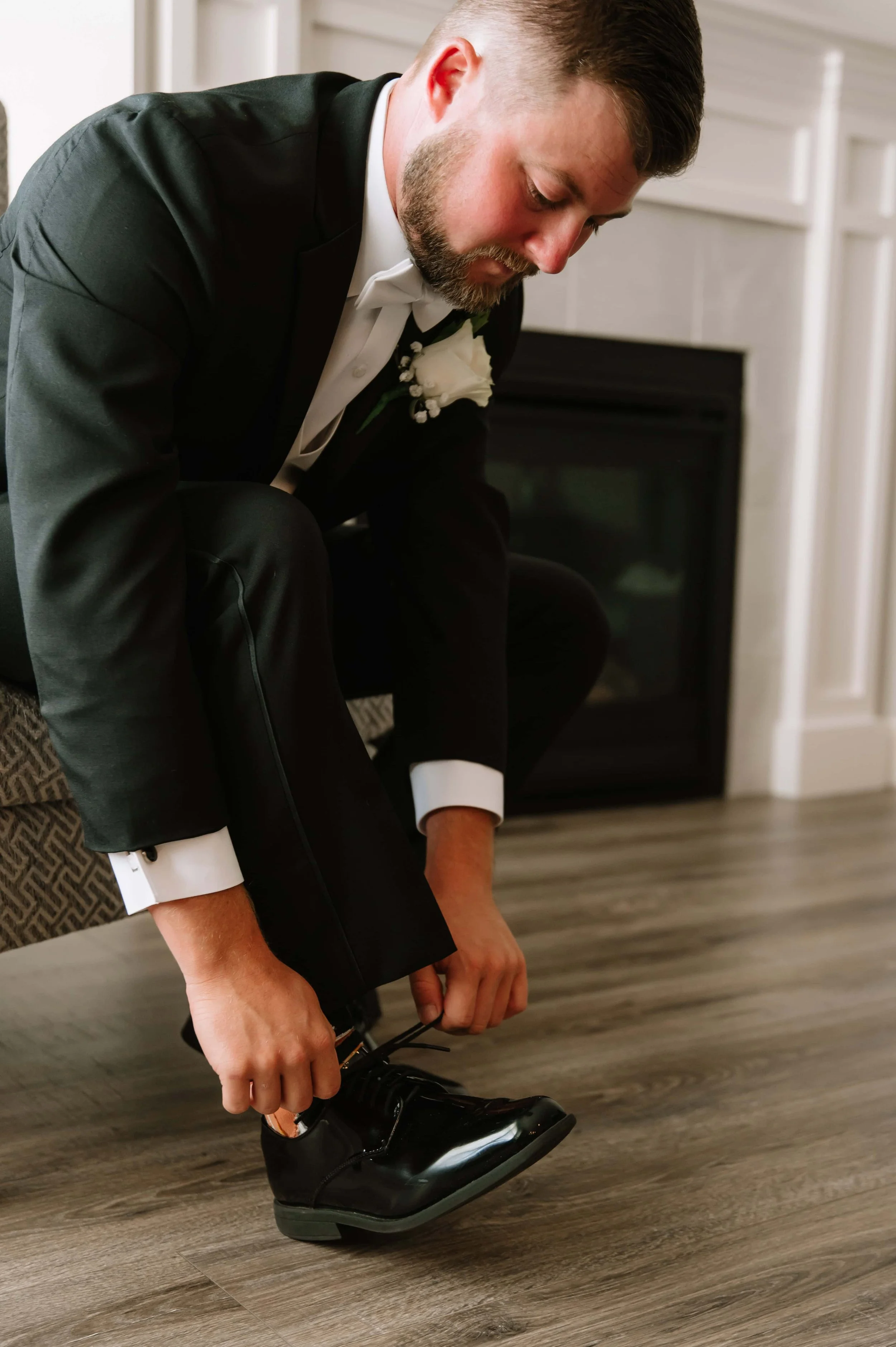 groom tying shoes.jpg