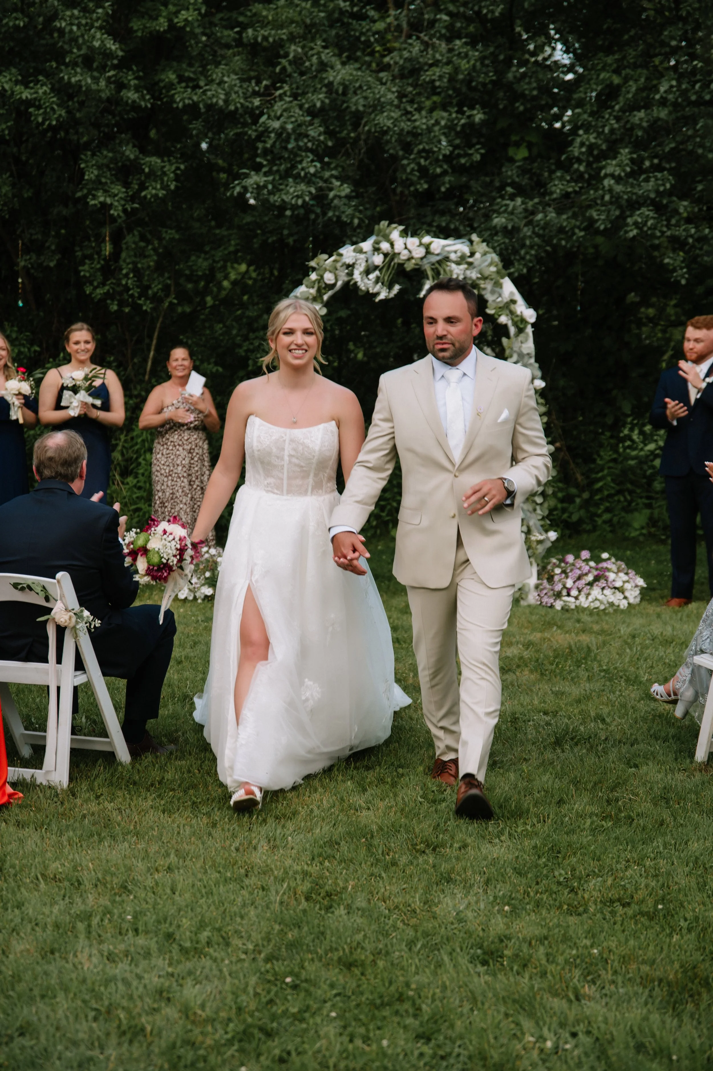 bride and groom walking up the aisle.jpg