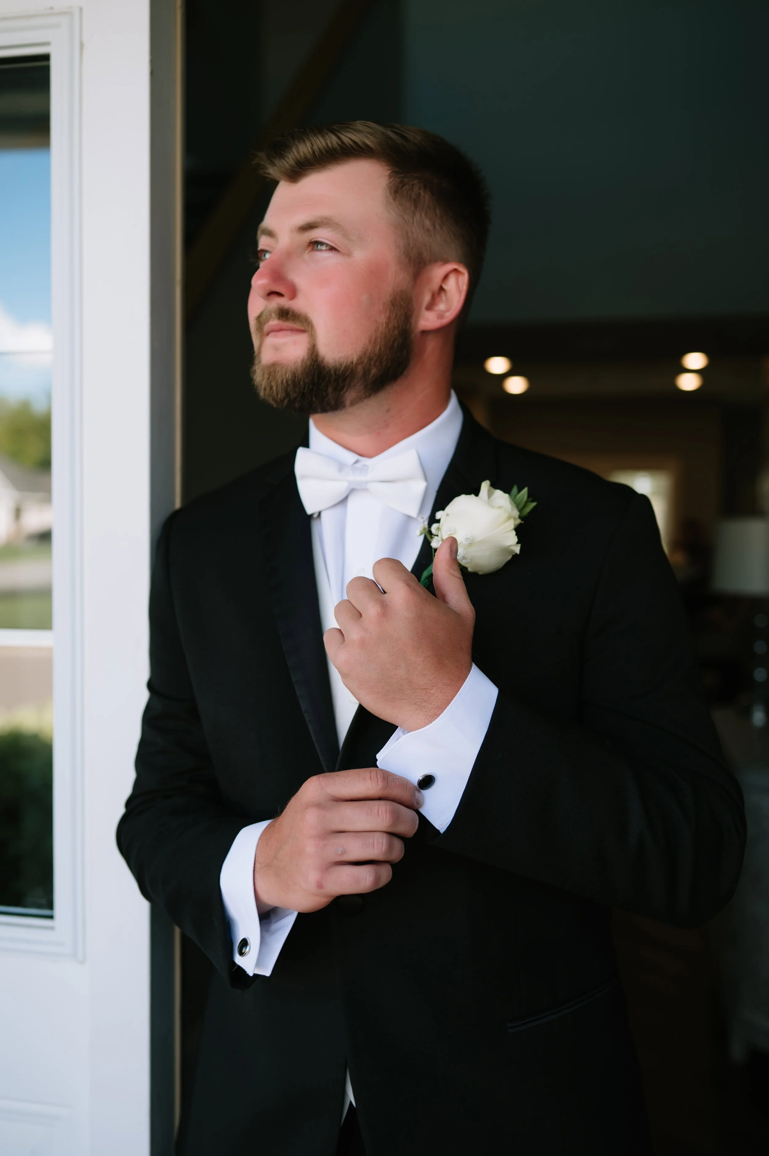 groom in doorway.jpg