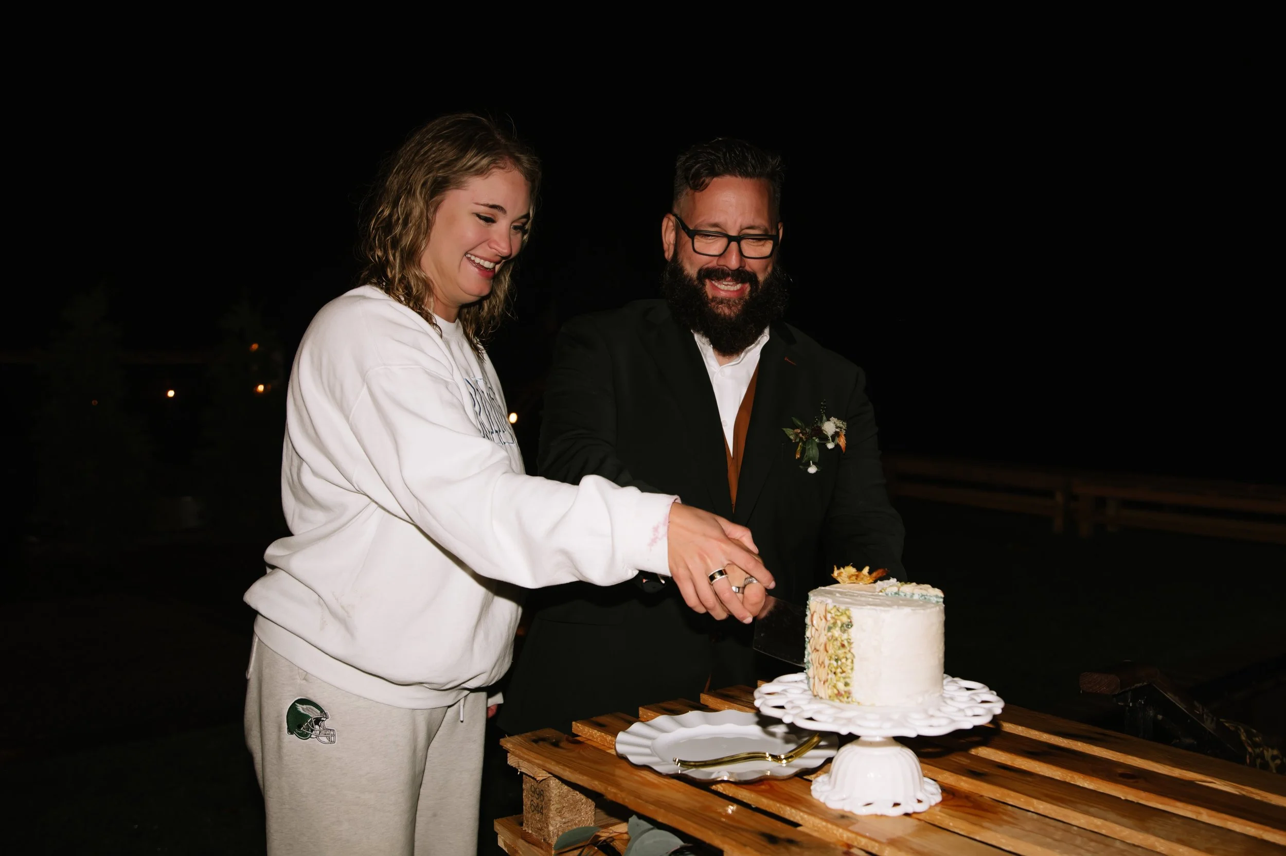 bride and groom cutting cake.jpg