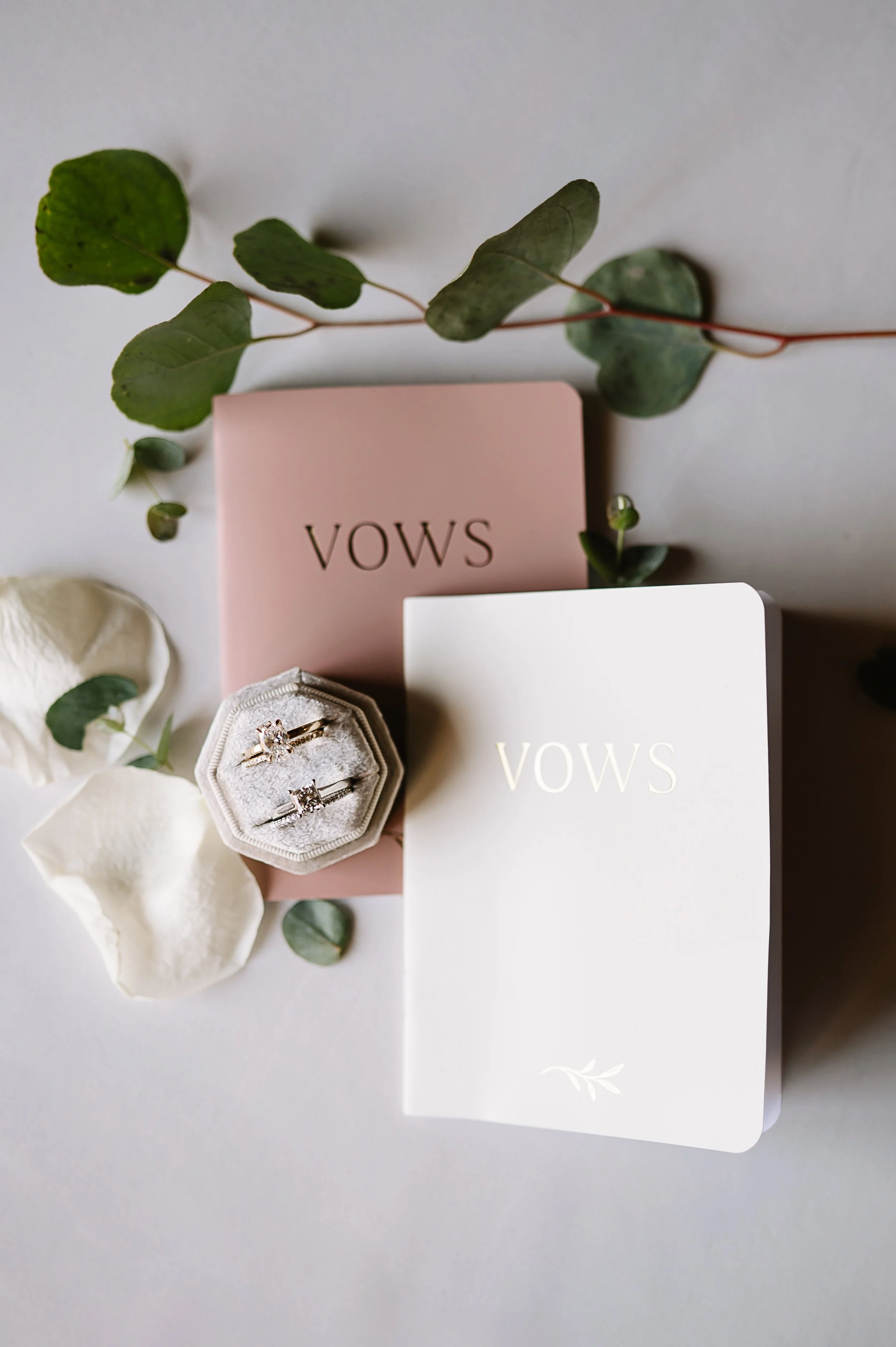 vow books and wedding rings.jpg