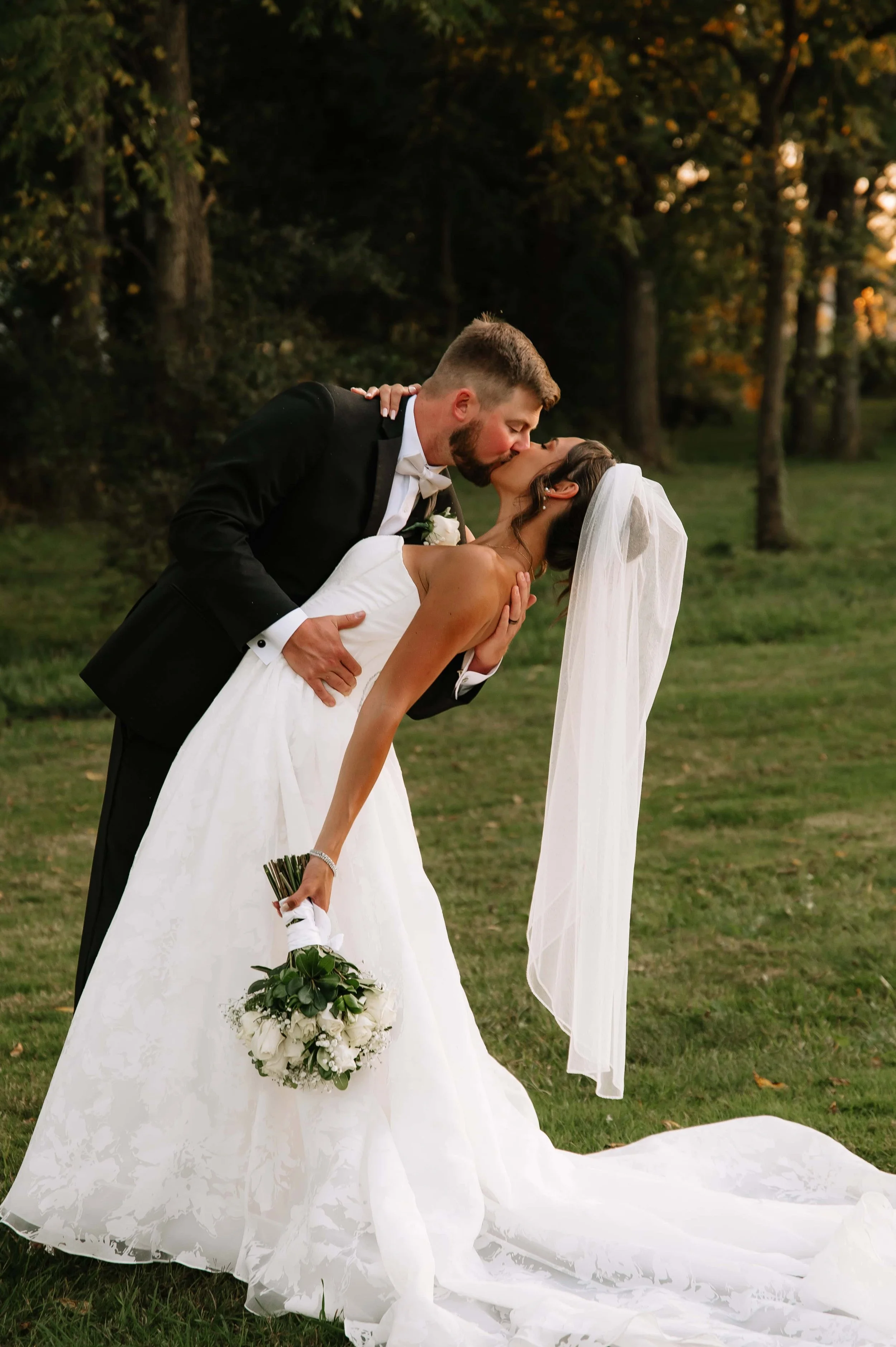 groom dipping bride.jpg