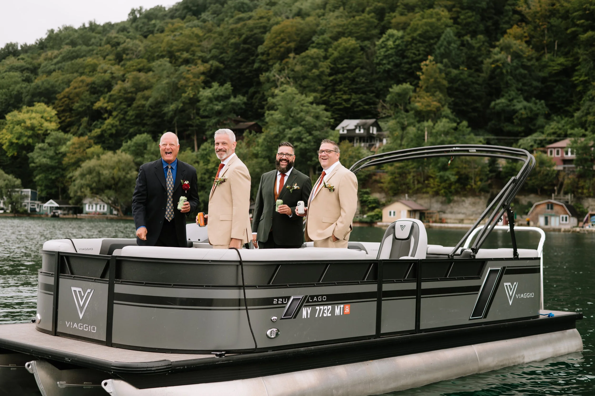 groom and groomsmen on baot.jpg