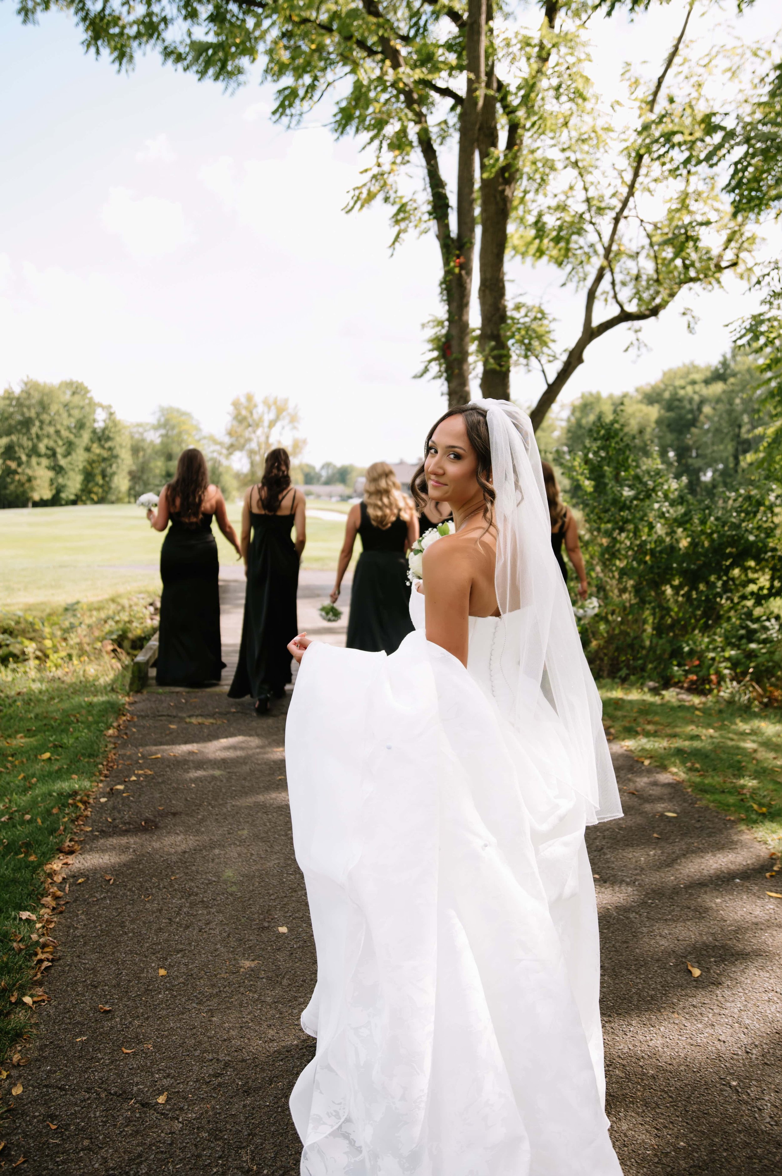 bride walking behind group.jpg