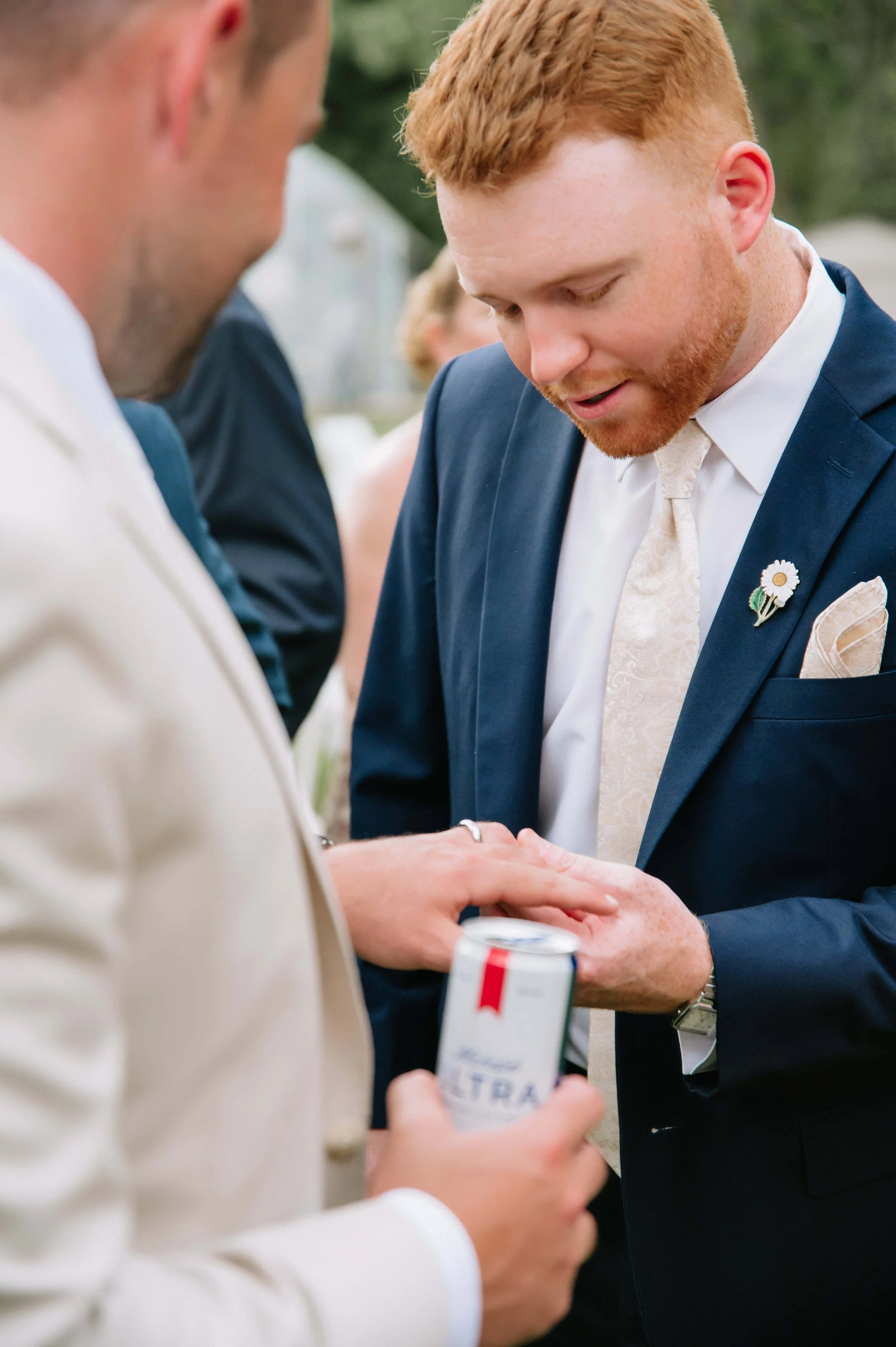 groom showing off his ring.jpg