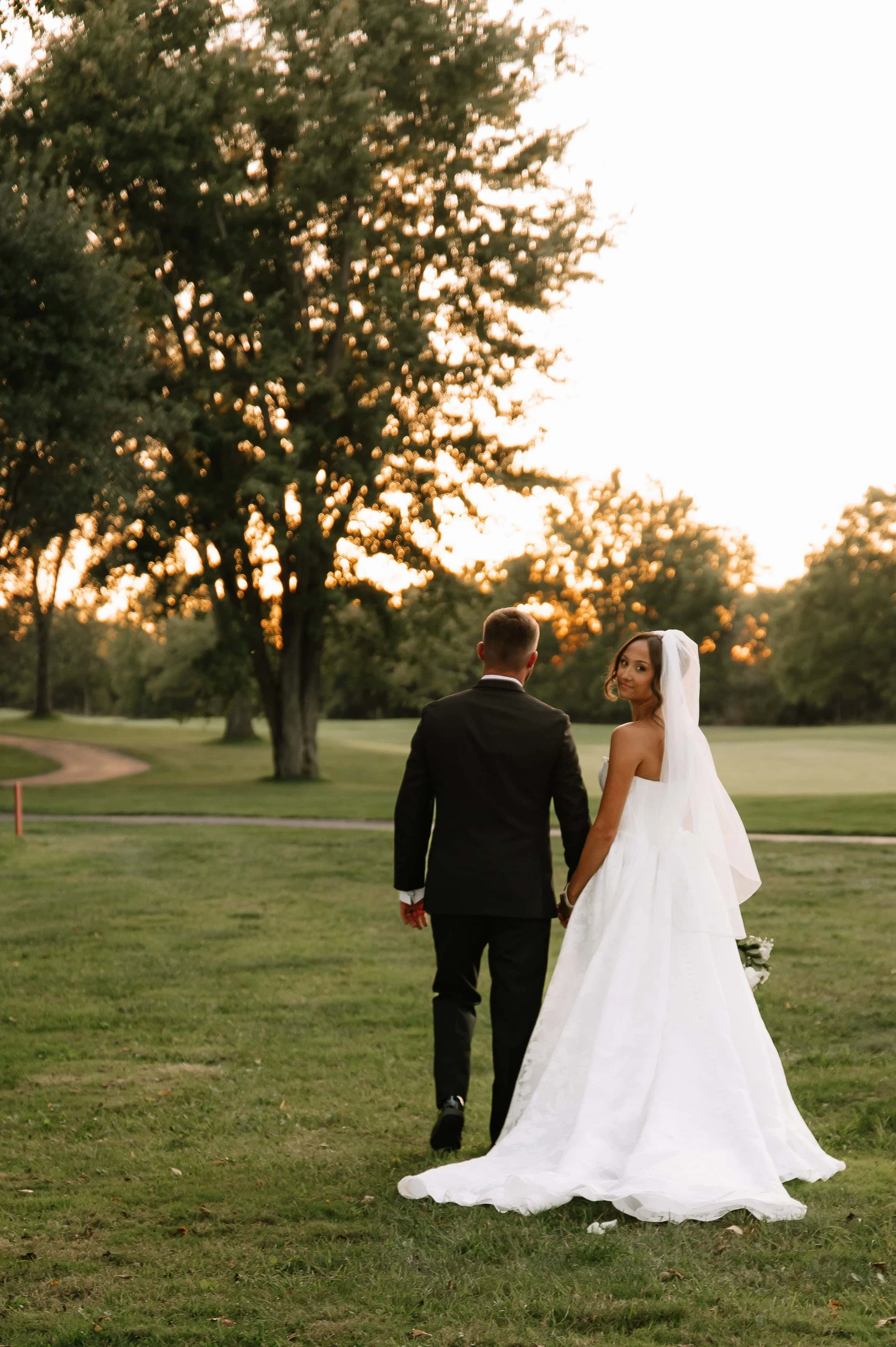 bride and groom walking away.jpg
