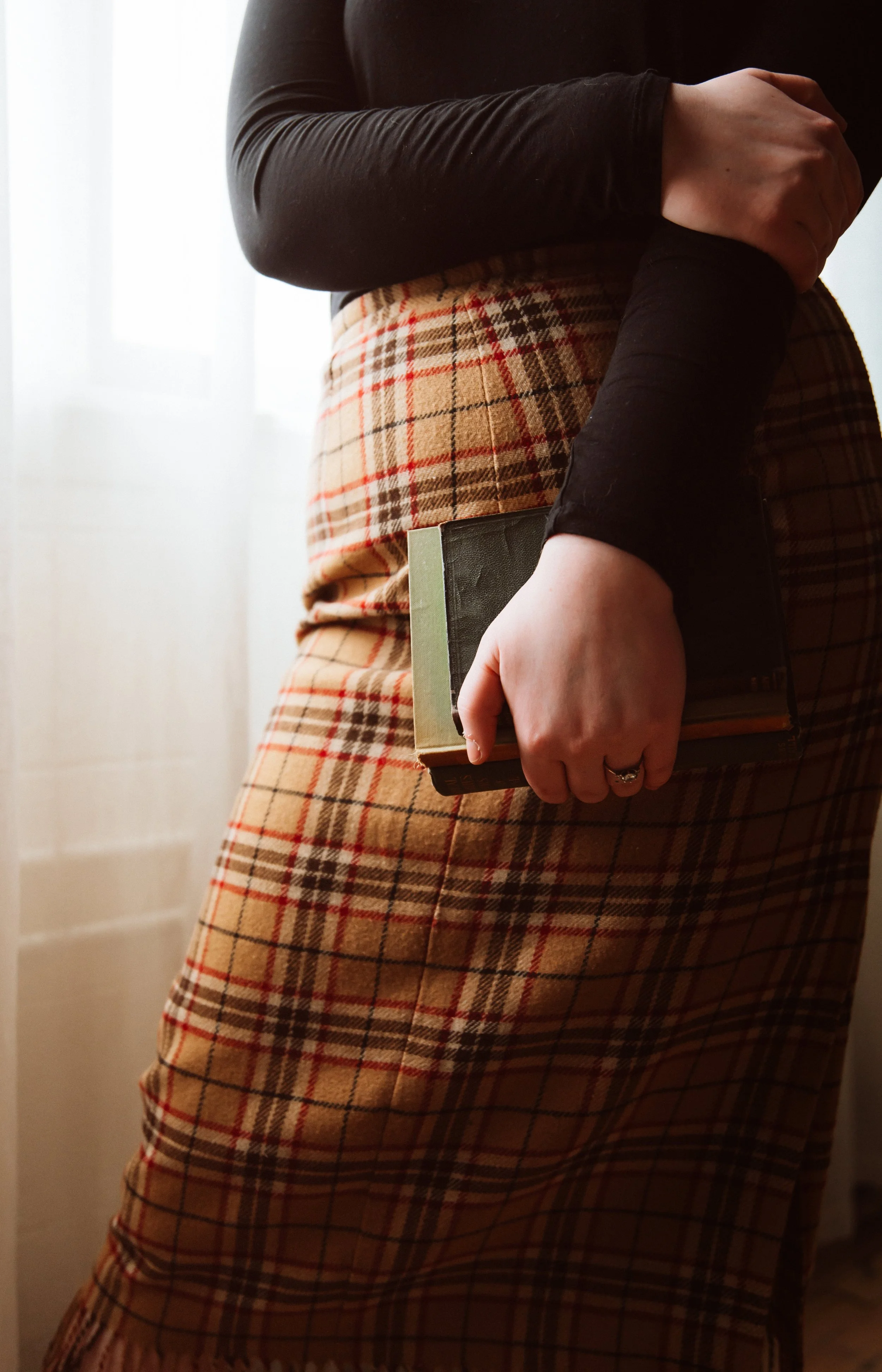 teacher holding book.jpg