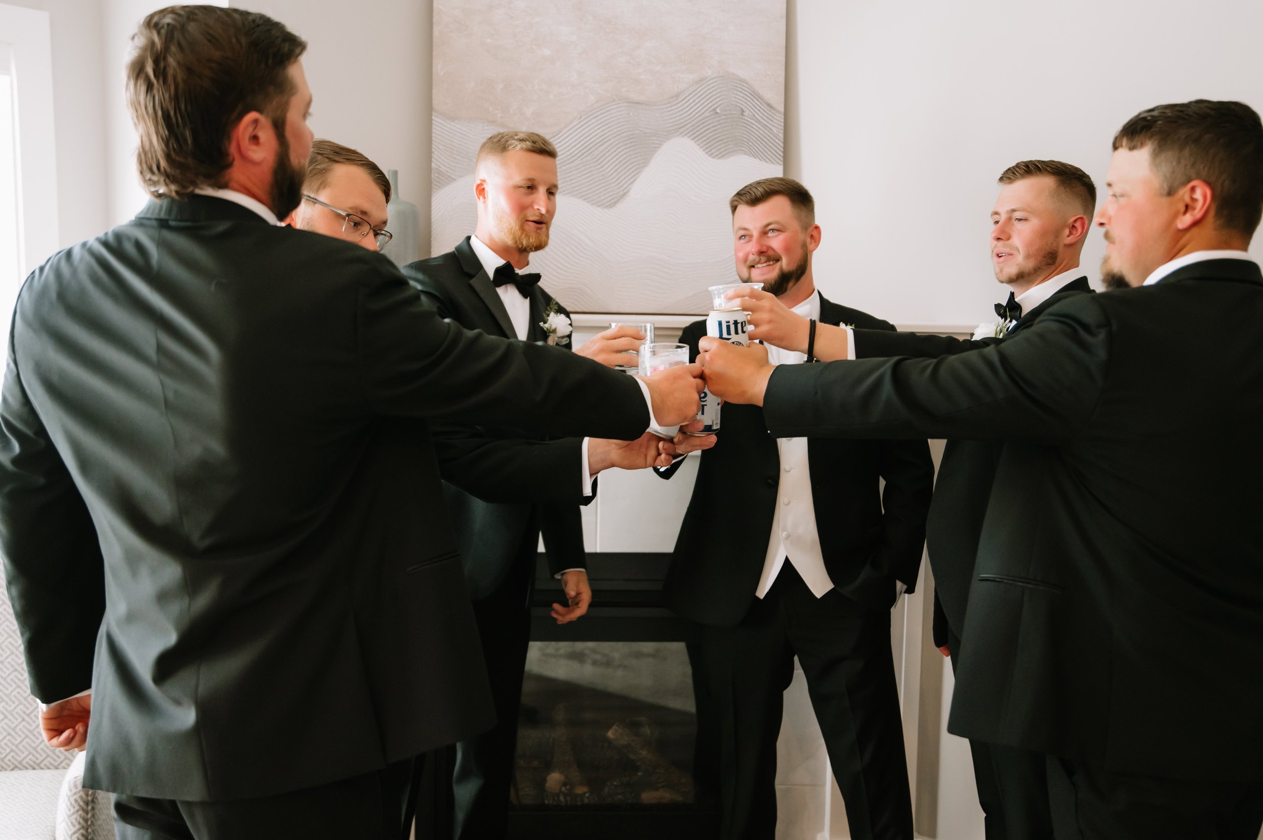 groom drinking before wedding.jpg