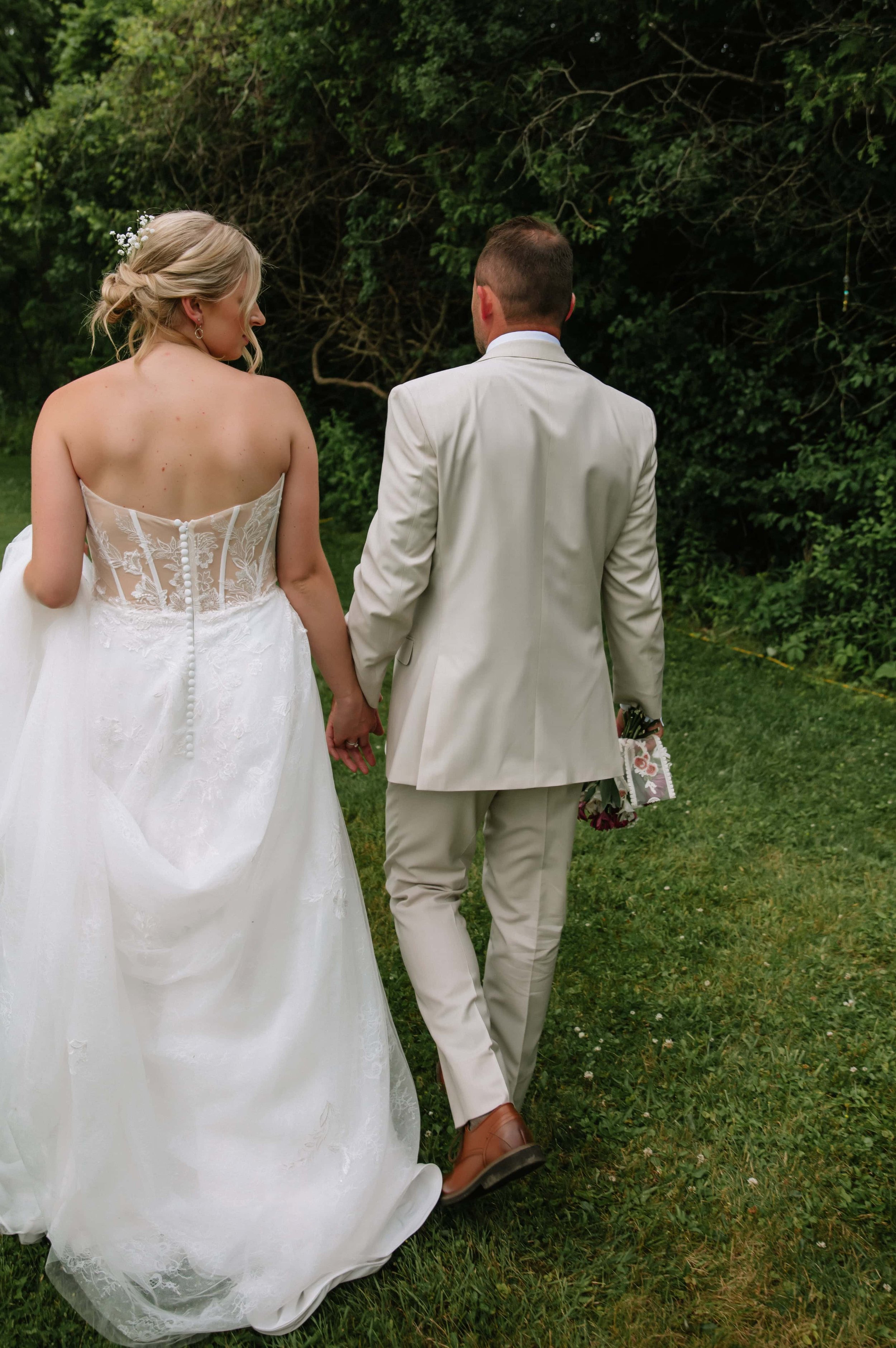 bride and groom walking.jpg