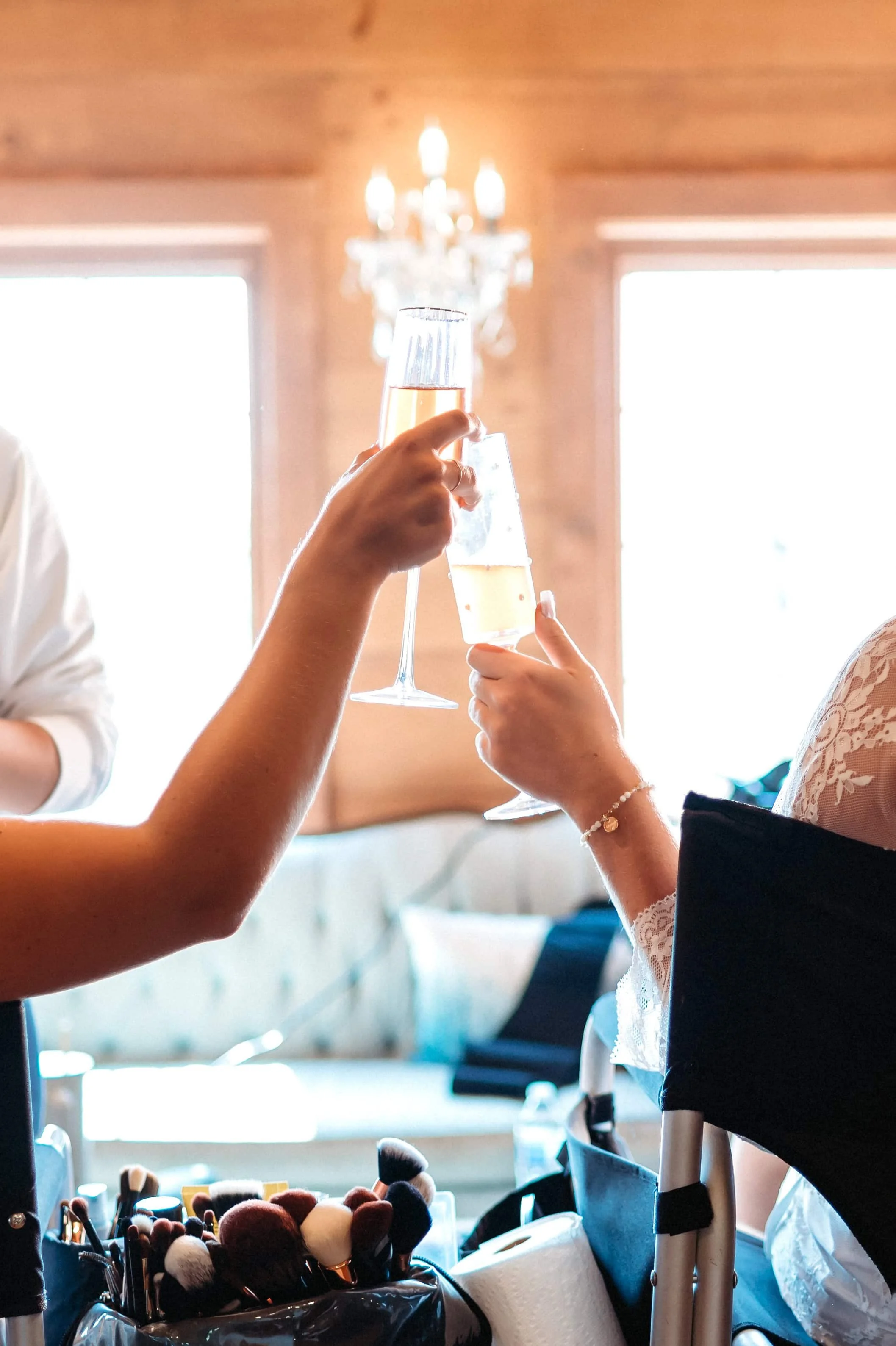 bridal party cheers with champaigne